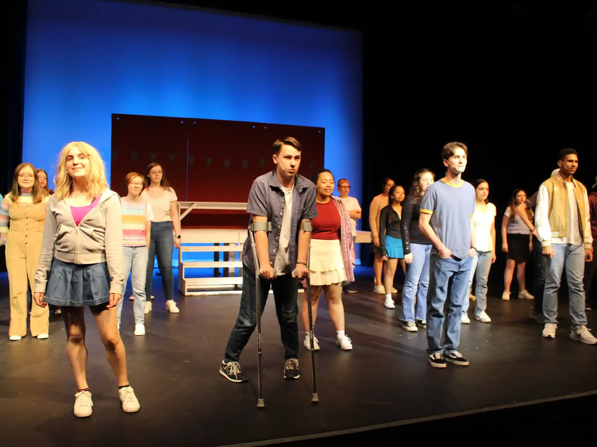 a group of people standing on a stage