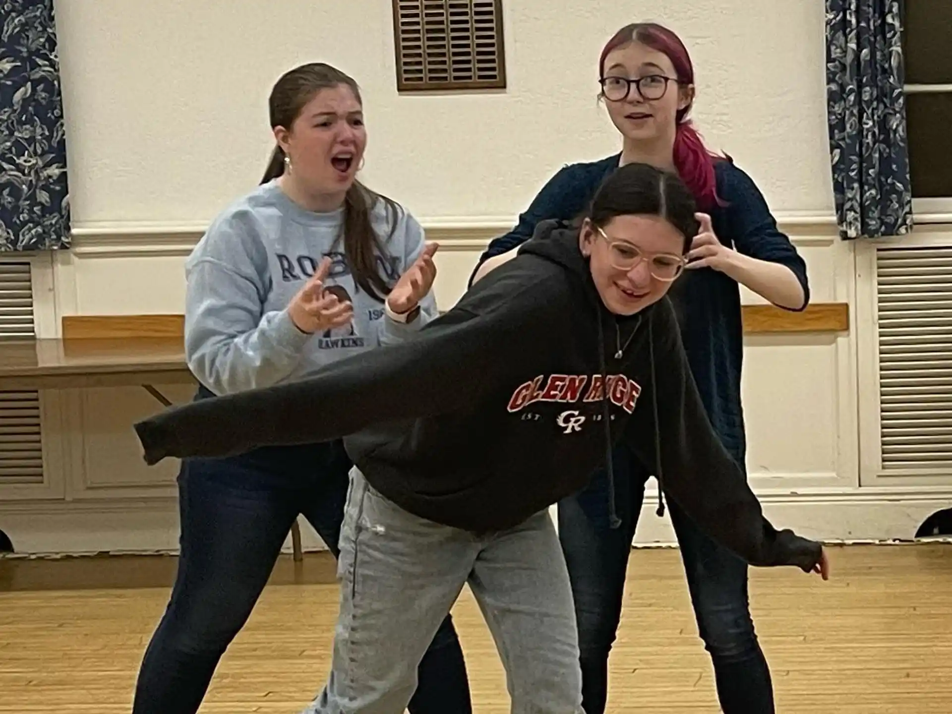 a group of people posing for the camera