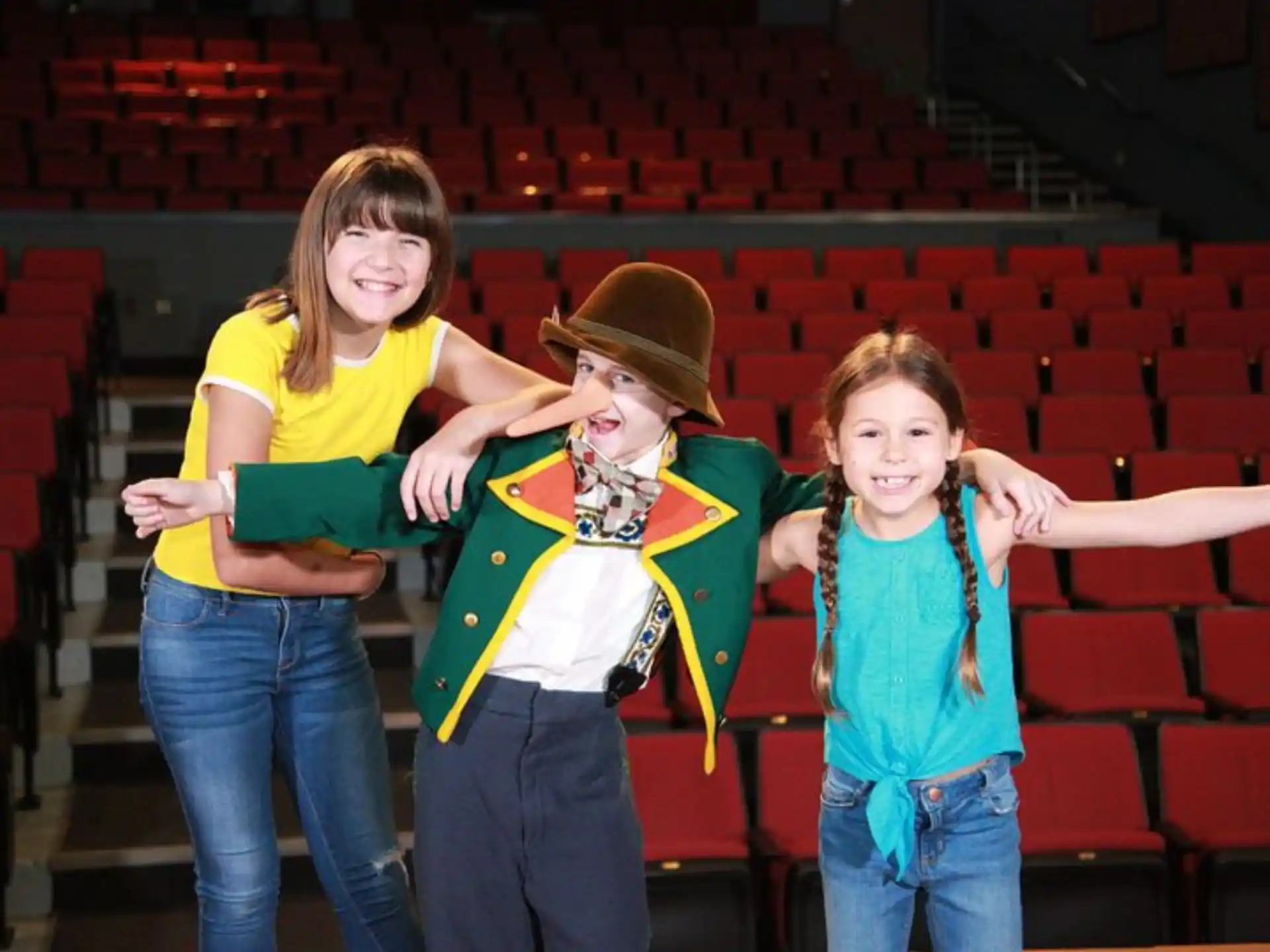 a group of people posing for the camera