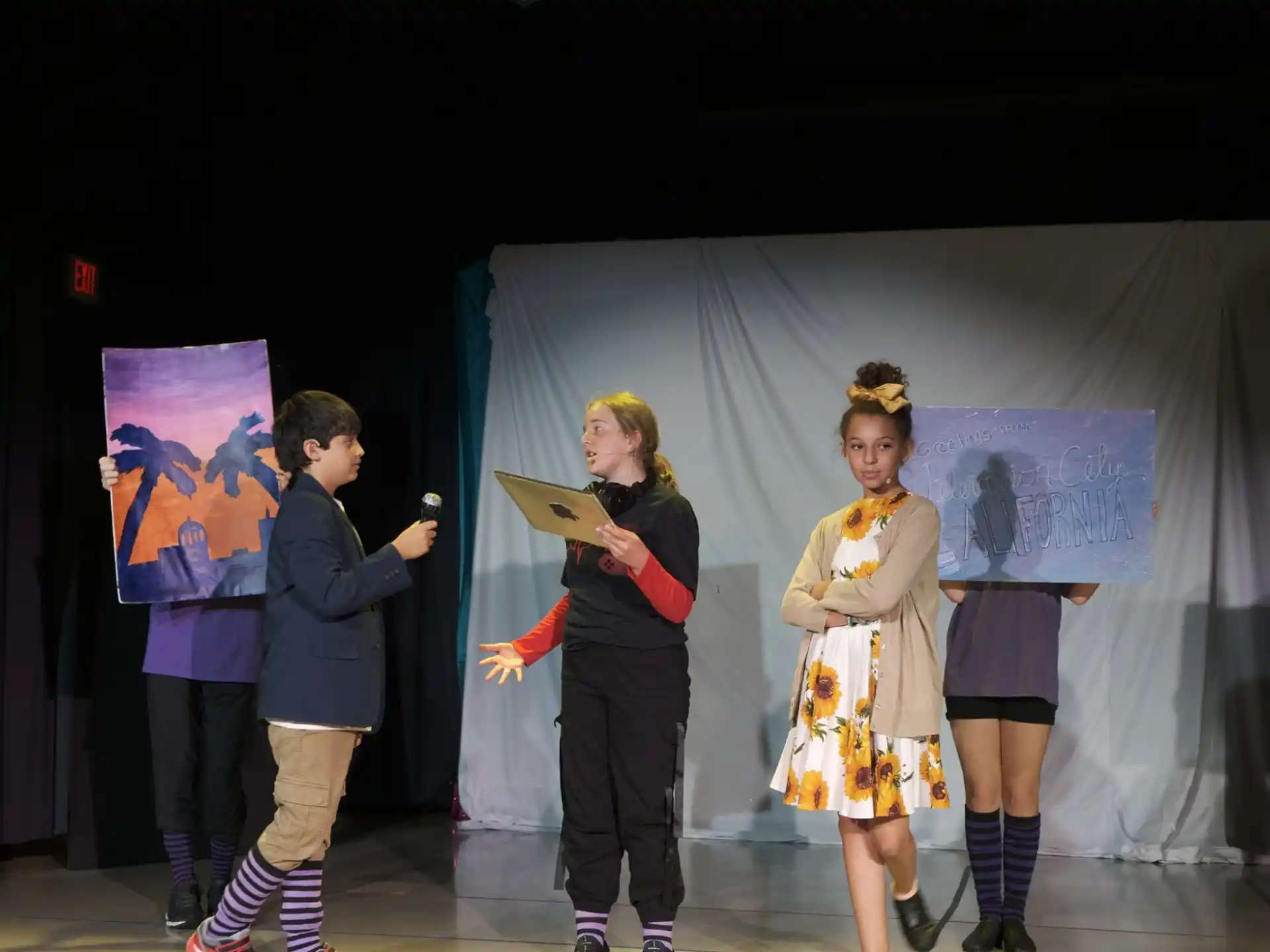 a group of people on a stage
