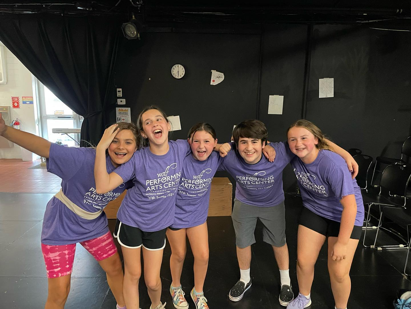 a group of girls posing for a picture