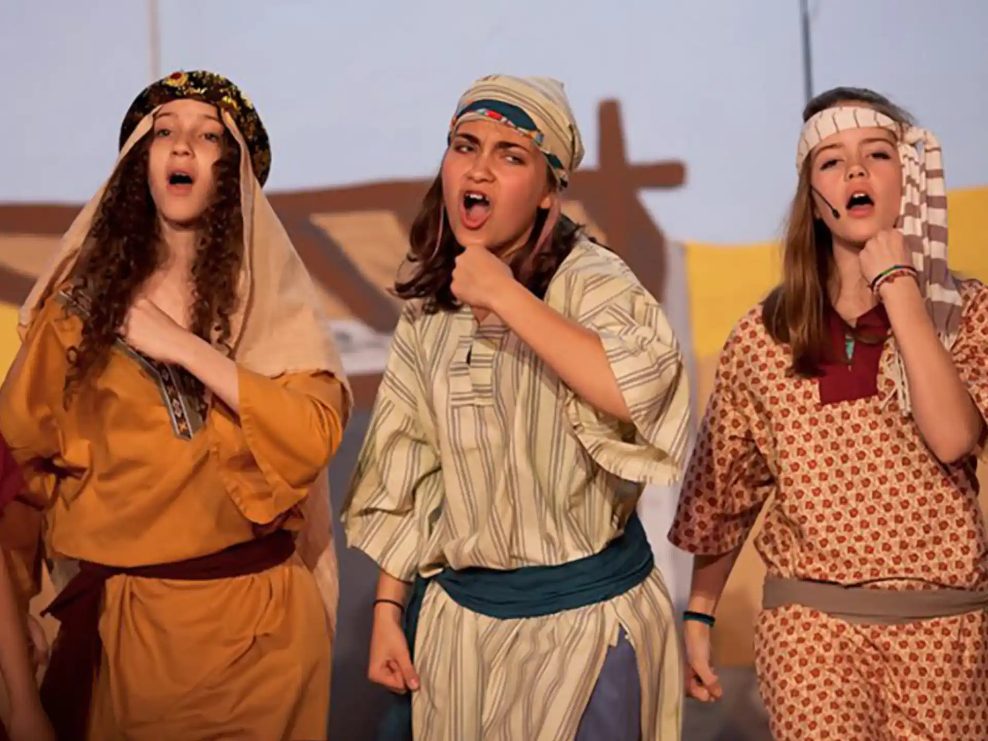 a group of women wearing clothing