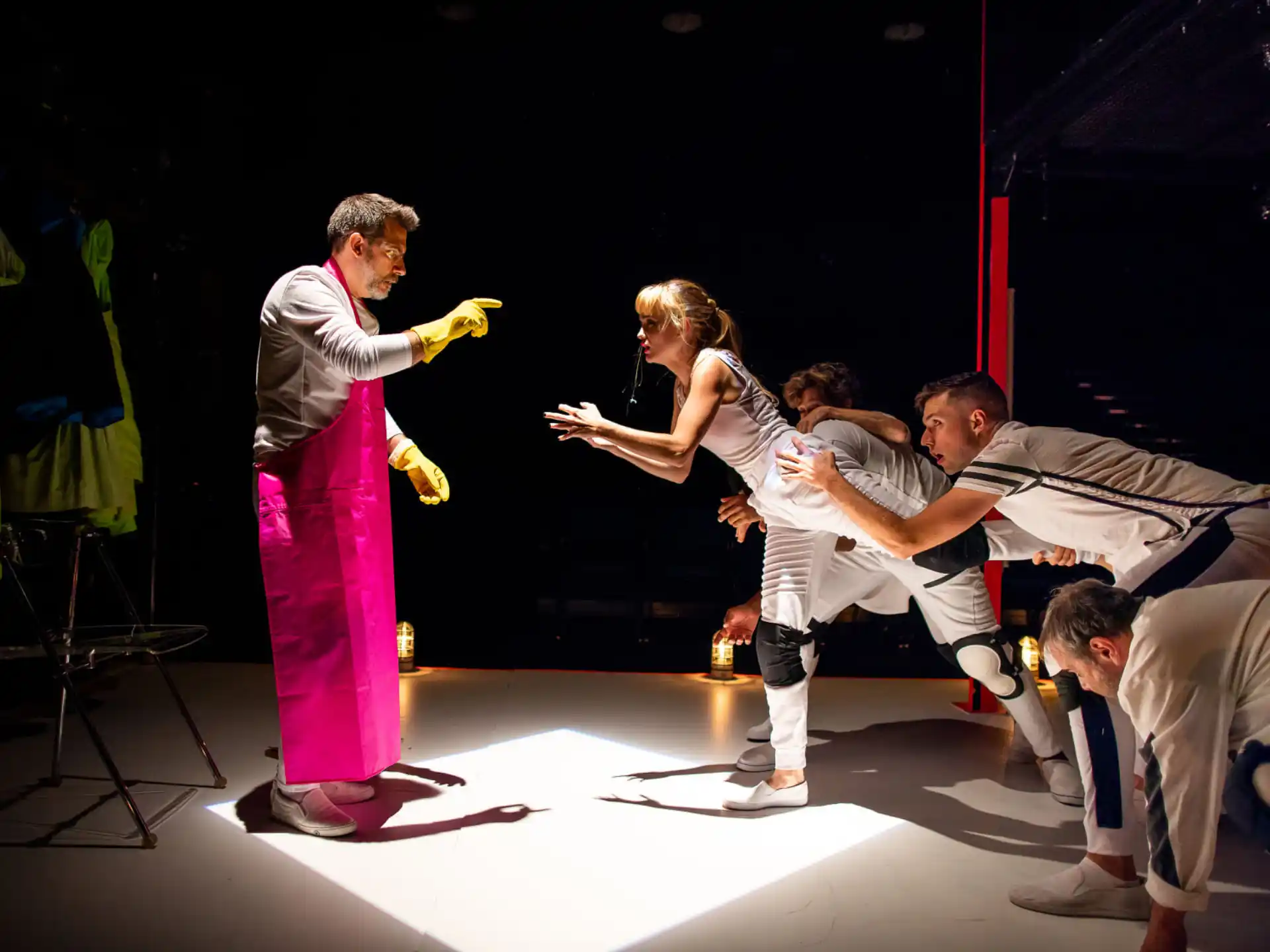 a group of people performing on a stage