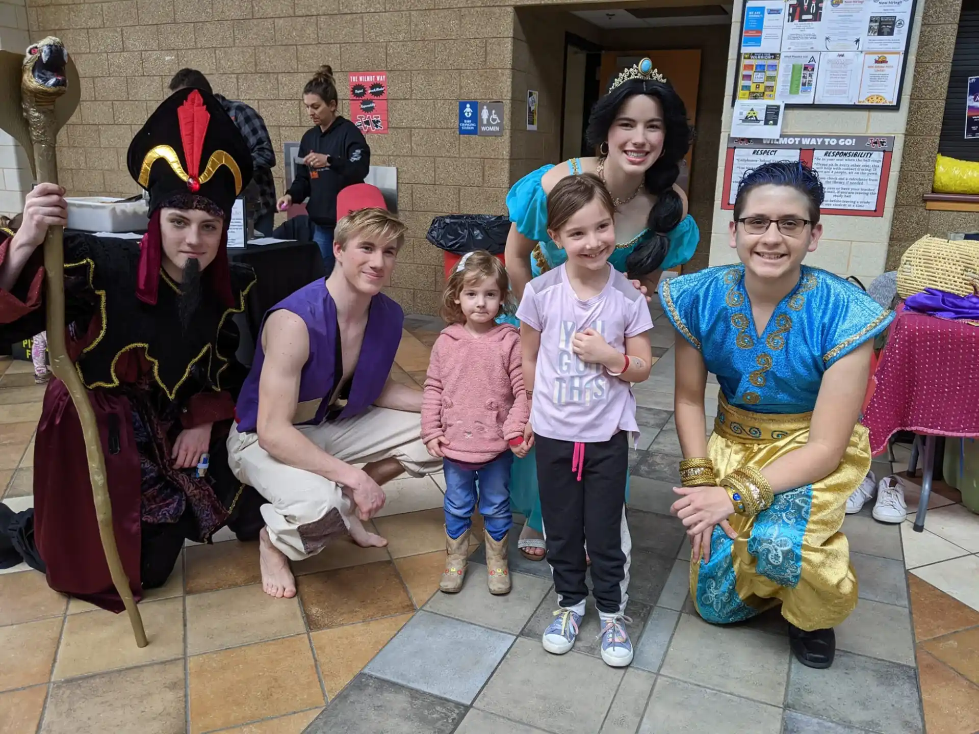 a group of people posing for a photo