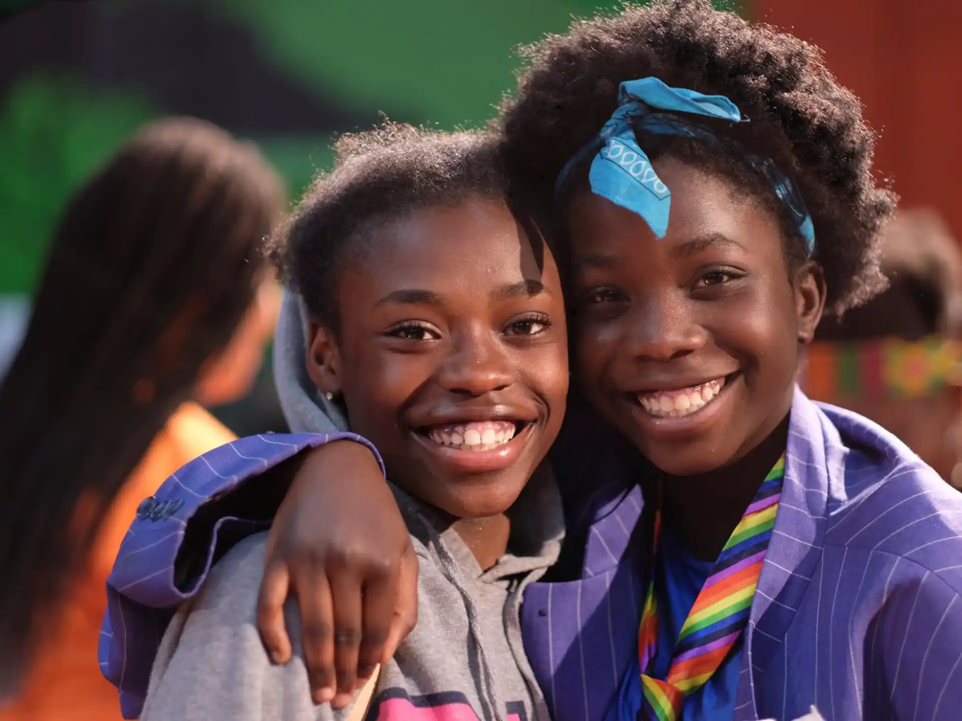 a couple of children smiling