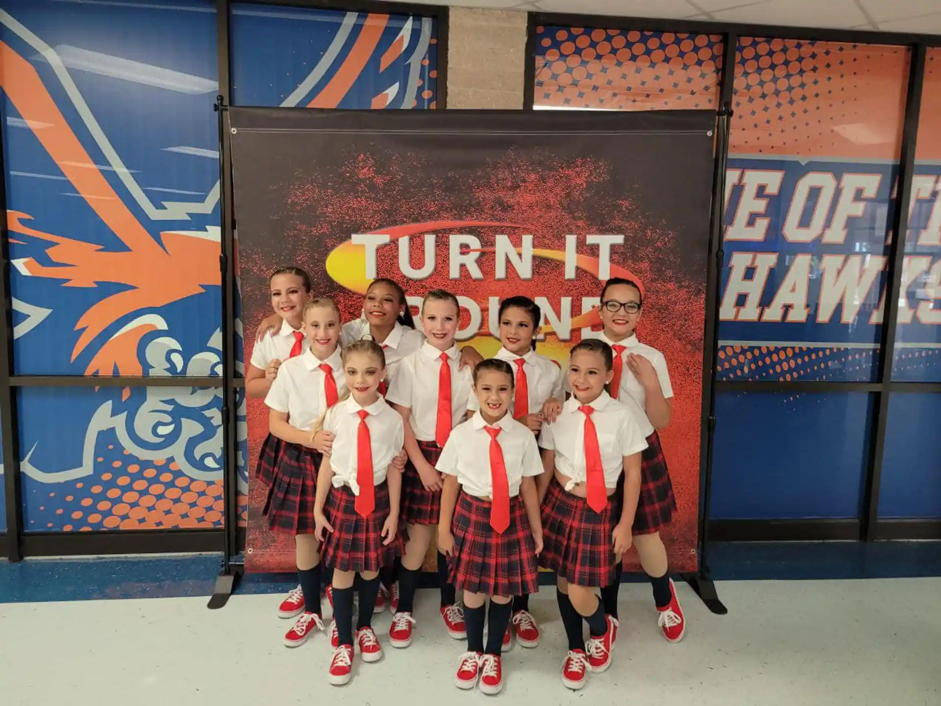 a group of children posing for a photo
