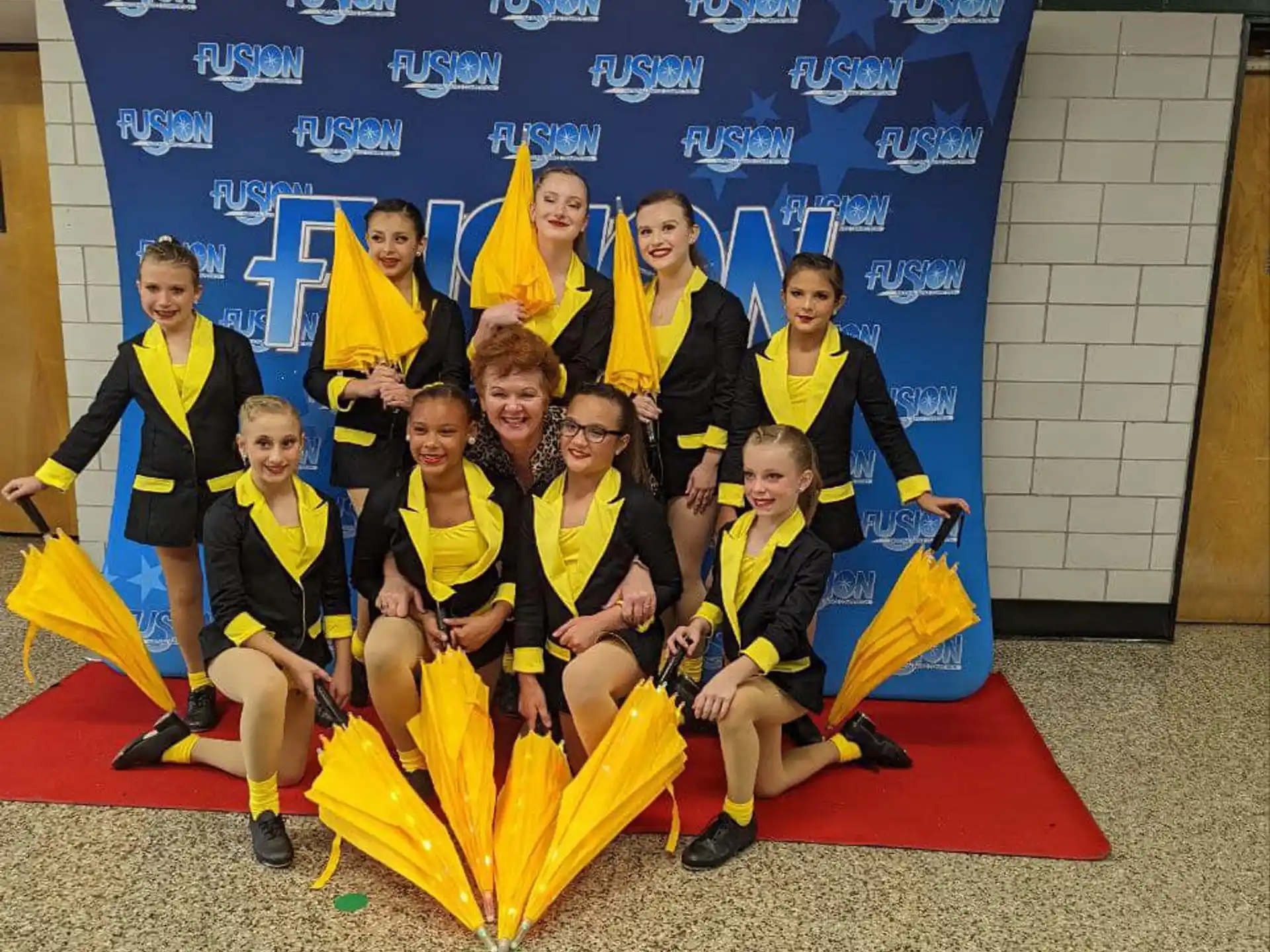a group of people in yellow uniforms