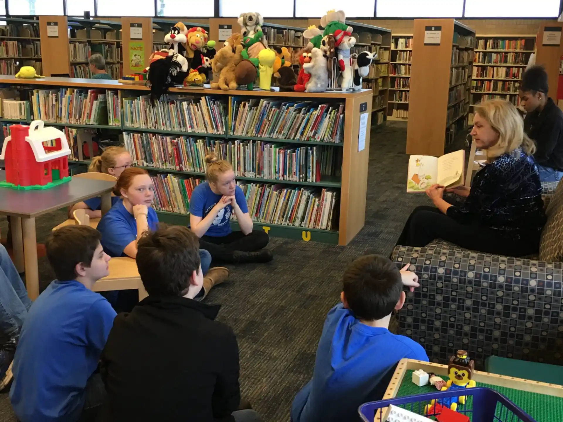 a group of people in a library