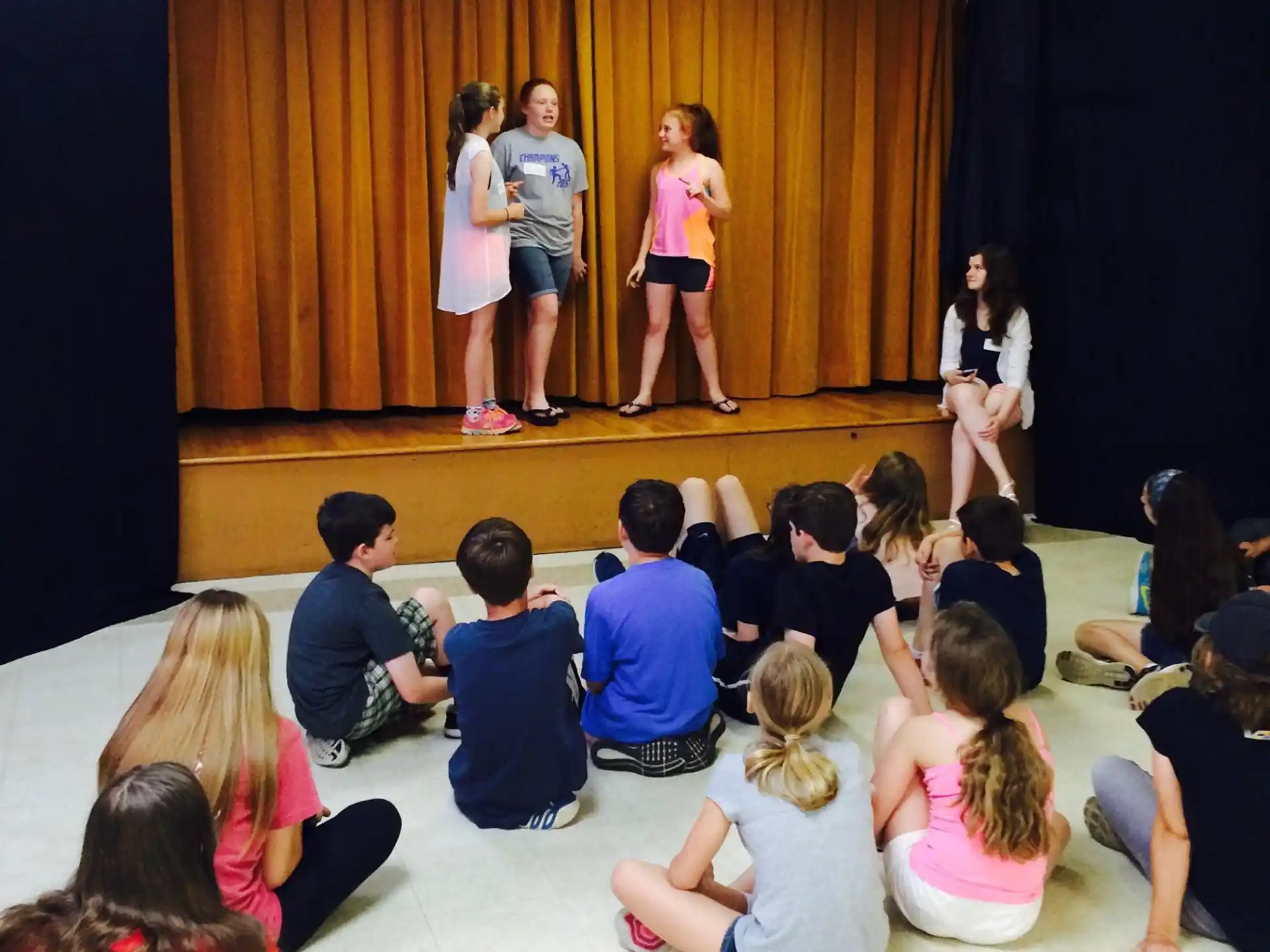 a group of people on a stage