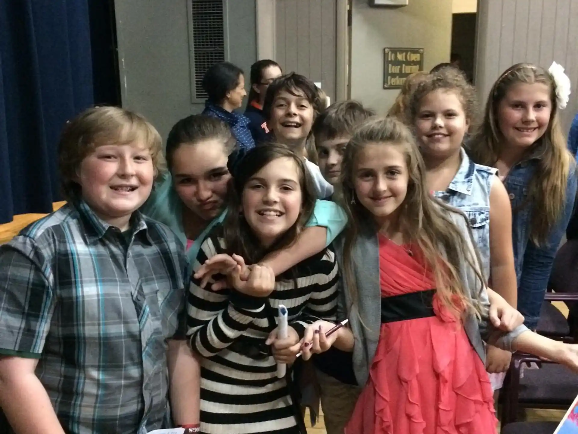 a group of people posing for a photo