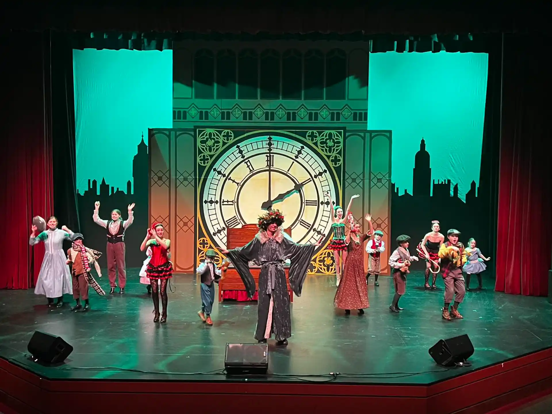 a group of people performing on a stage