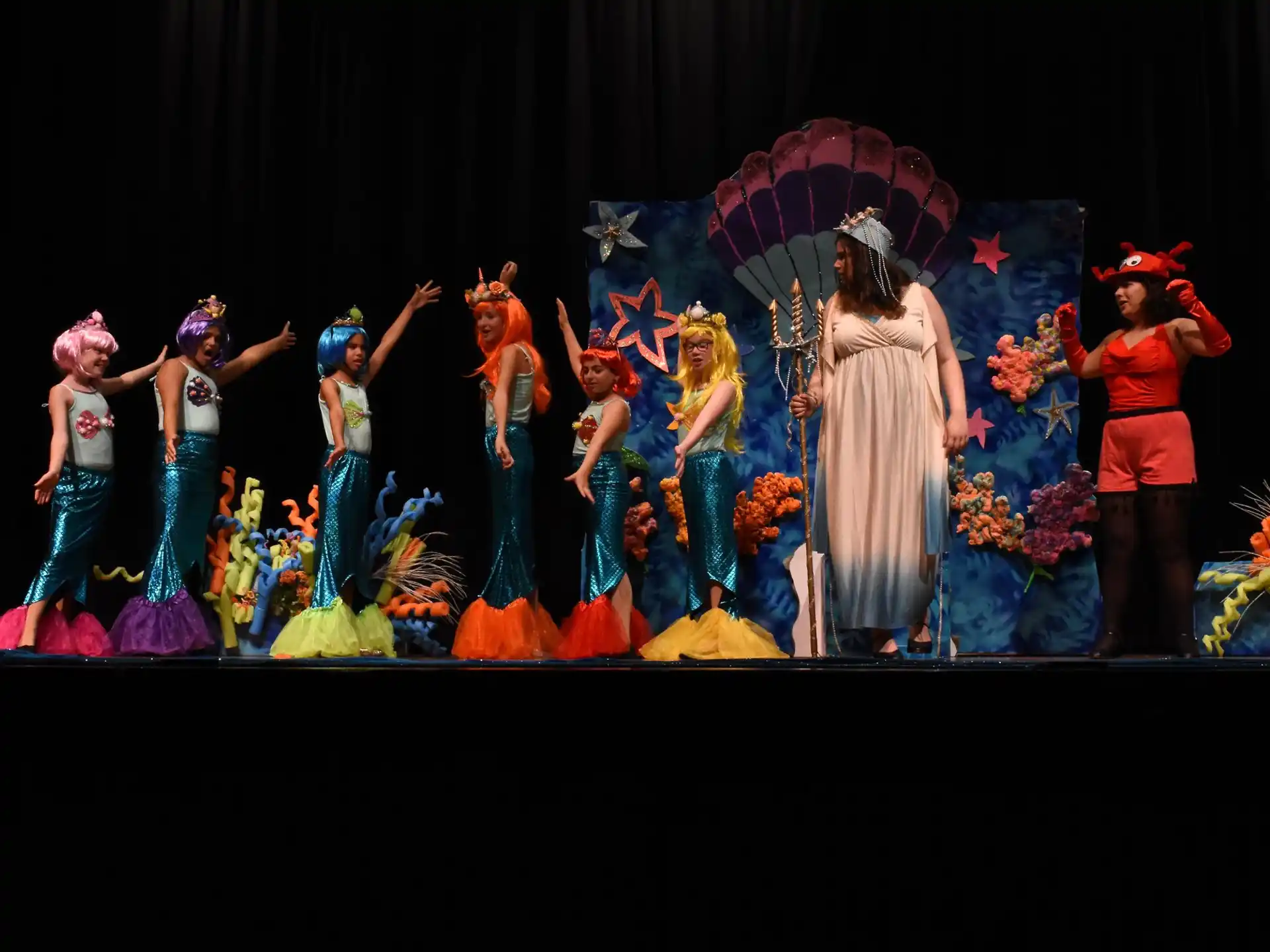 a group of people on a stage