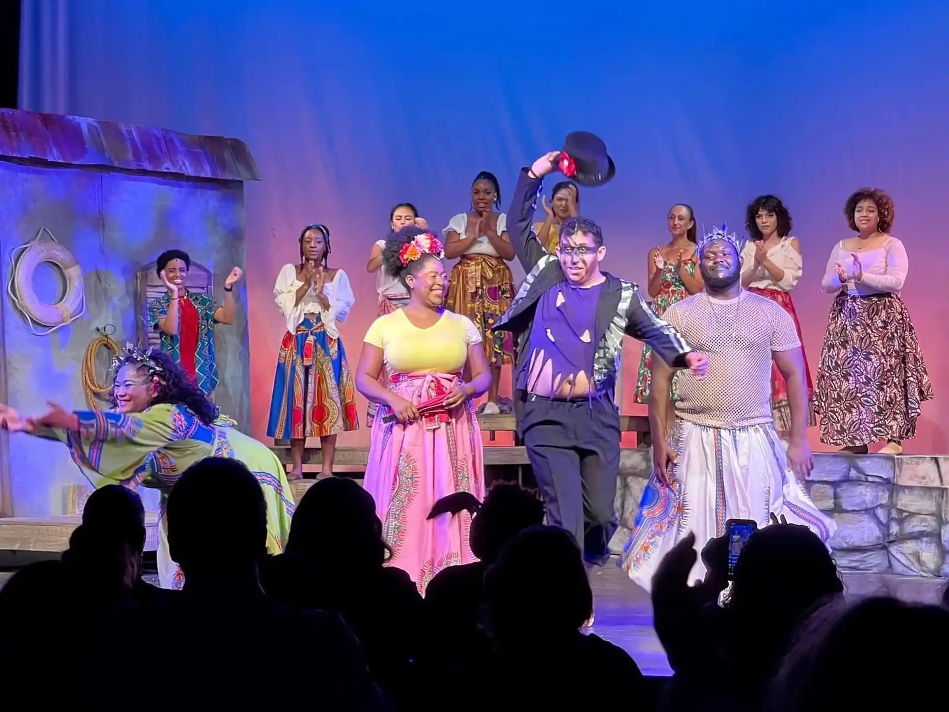 a group of people on a stage