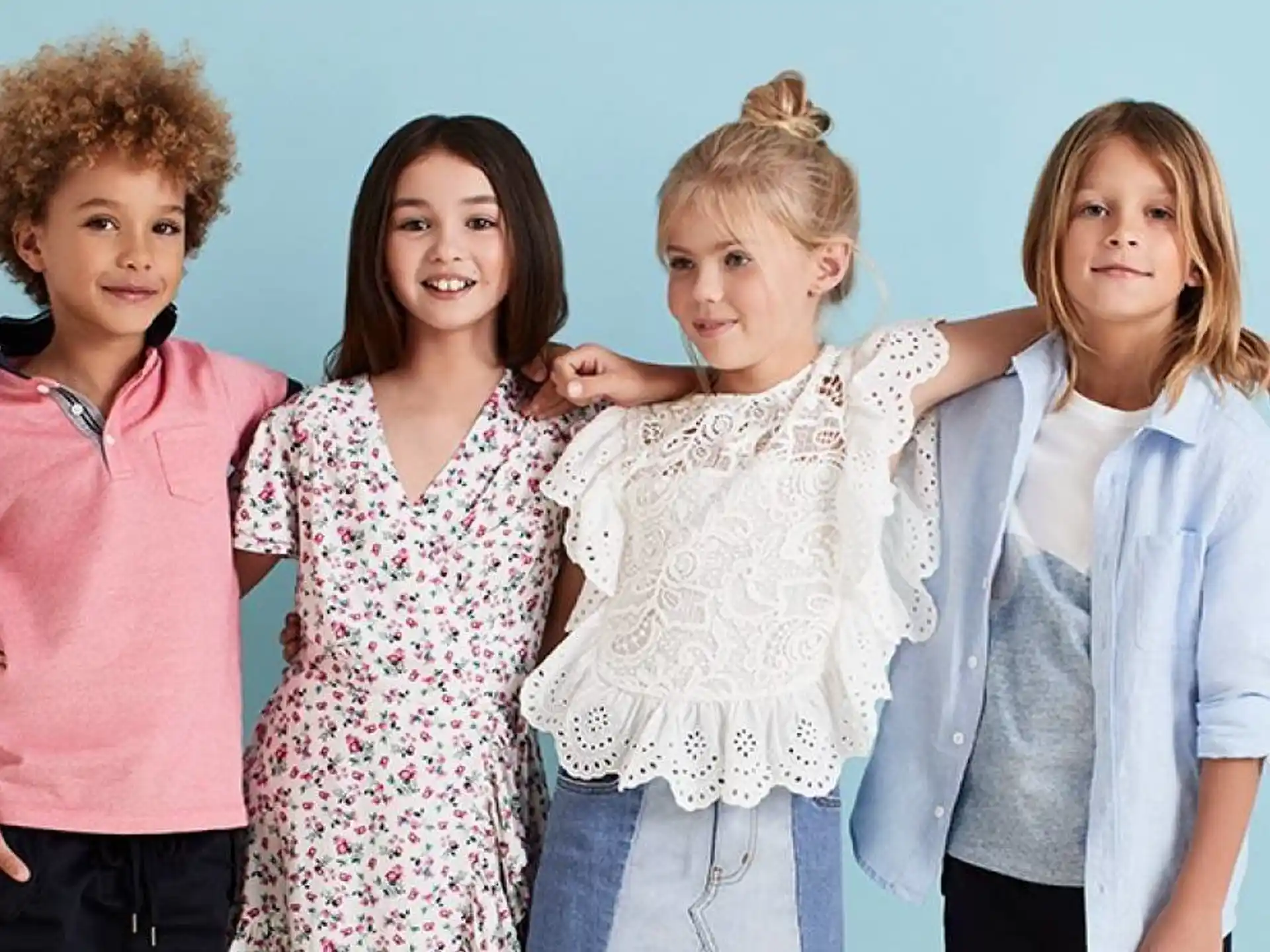 a group of children posing for a photo