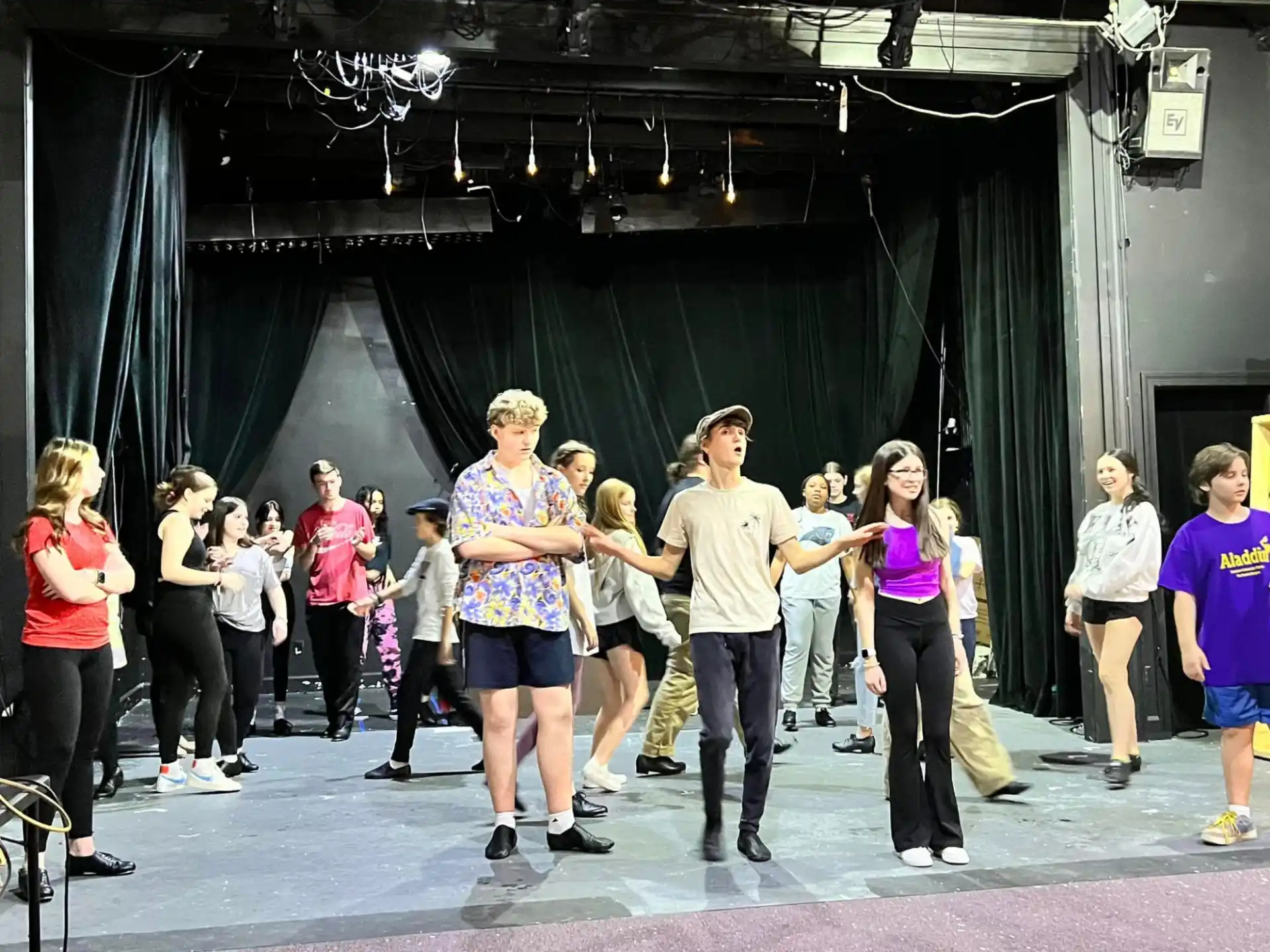a group of people standing in a room