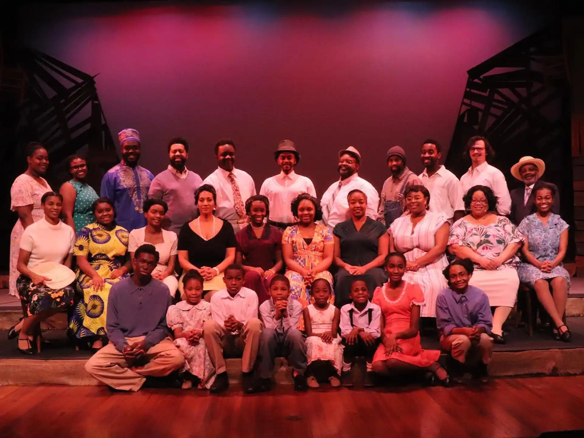 a group of people posing for a photo