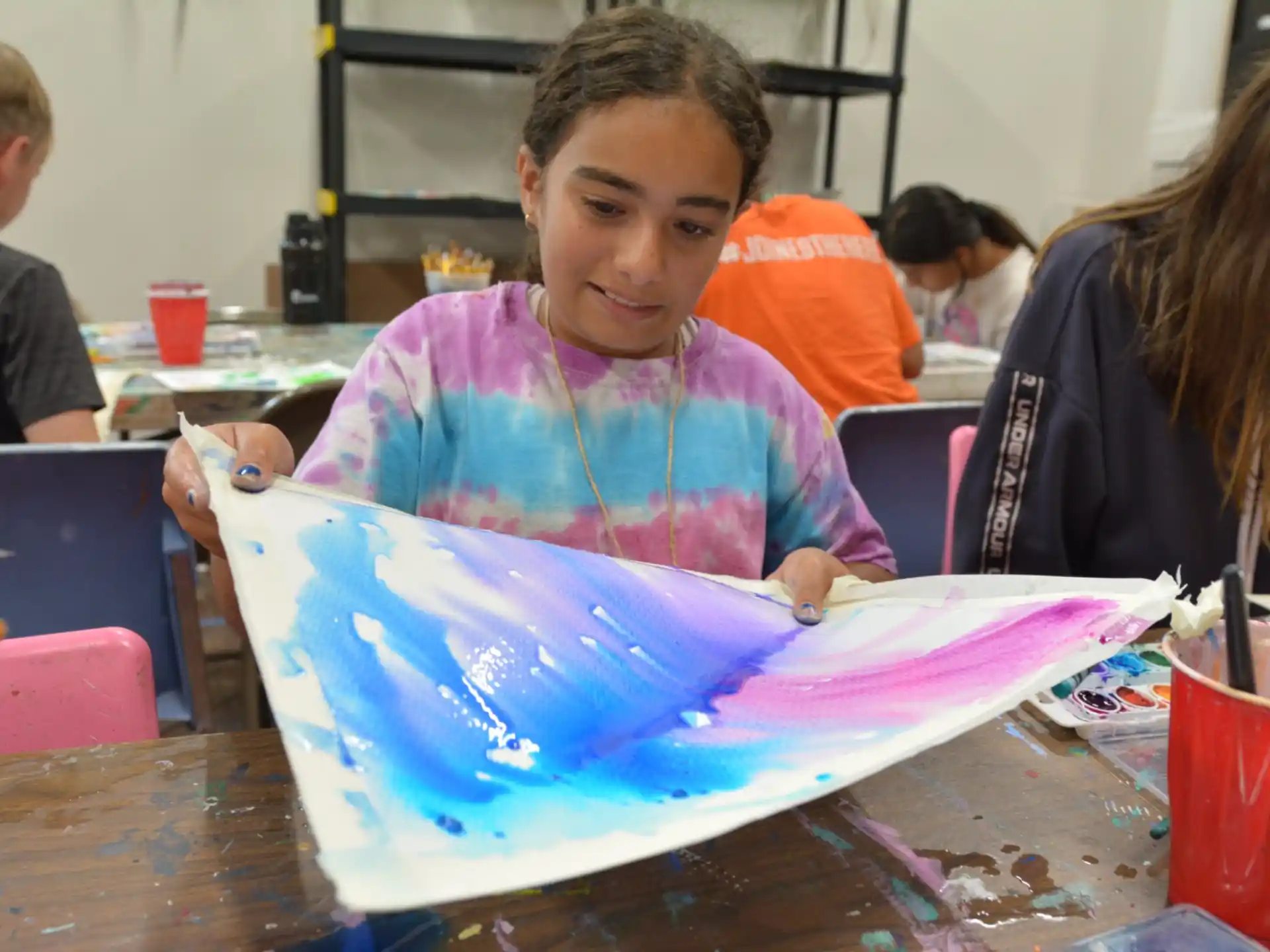 a young boy painting