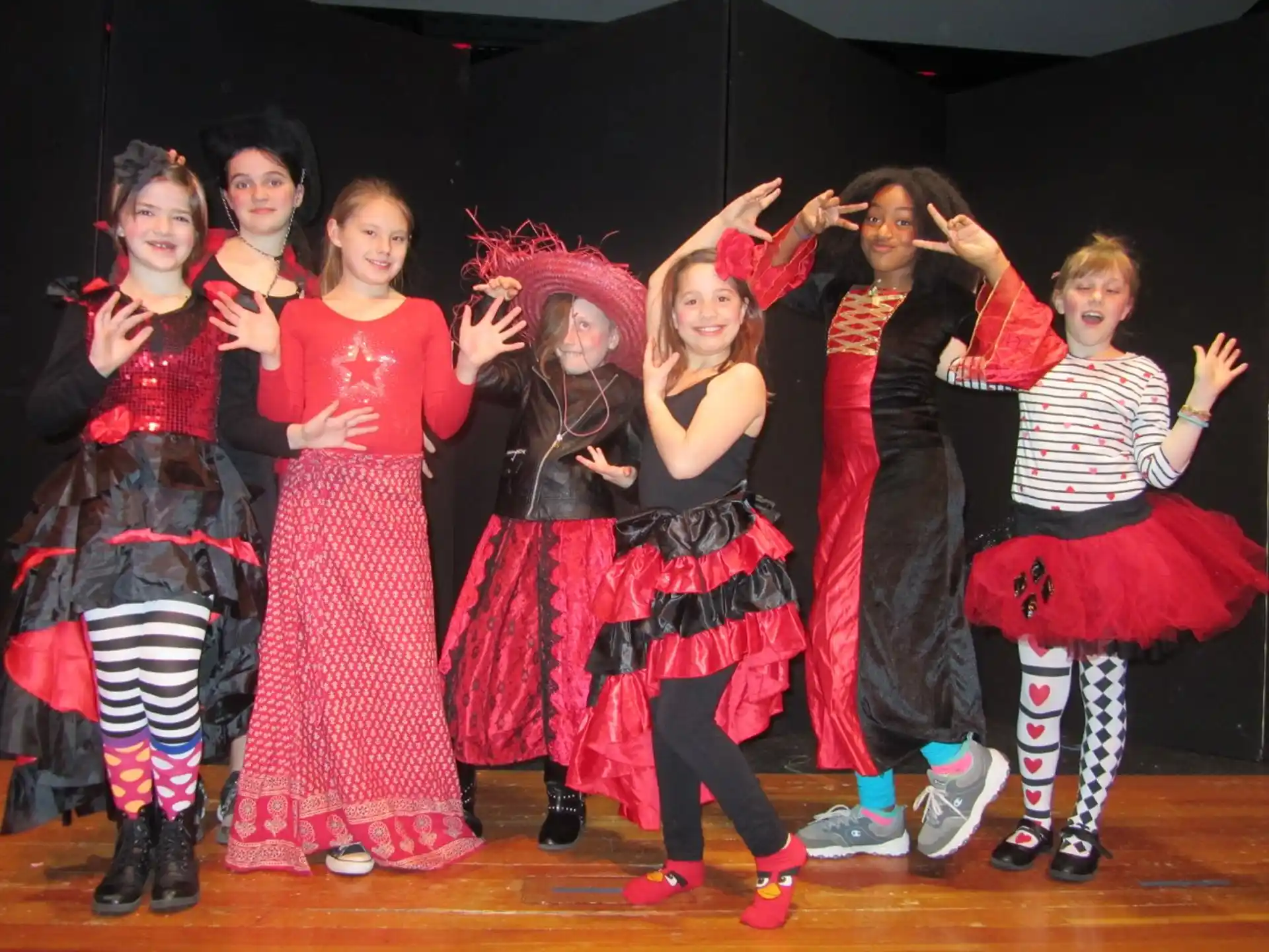 a group of women posing for a photo