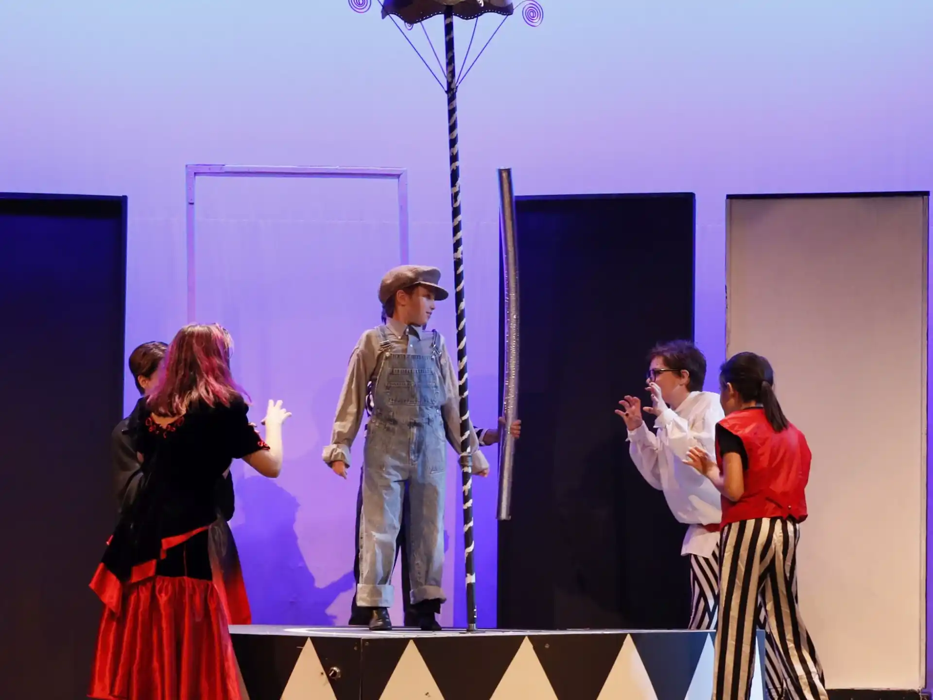 a group of people on a stage