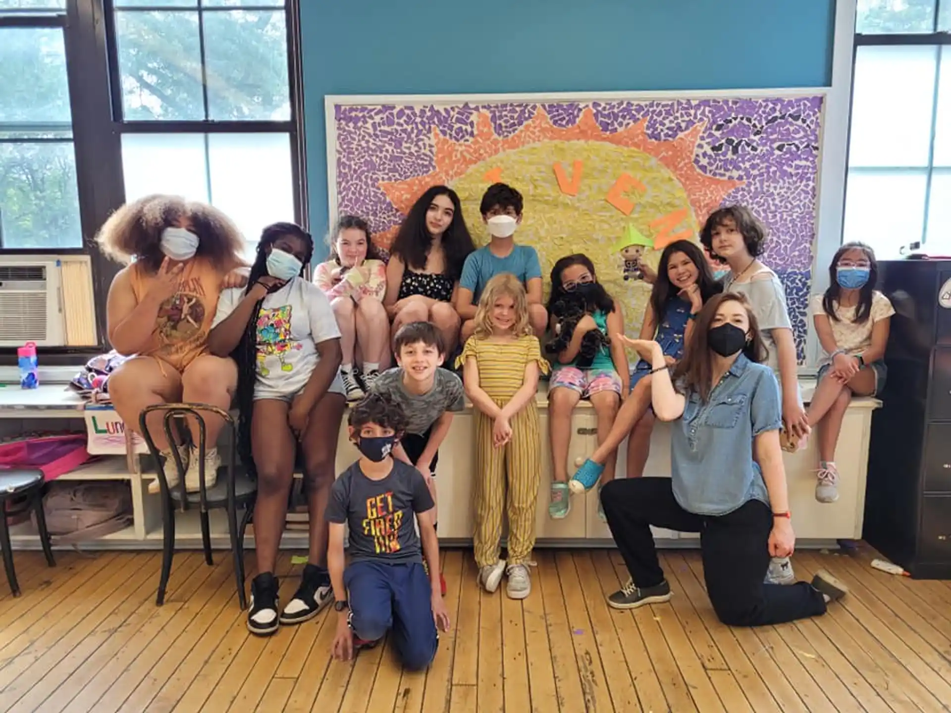 a group of people posing for a photo