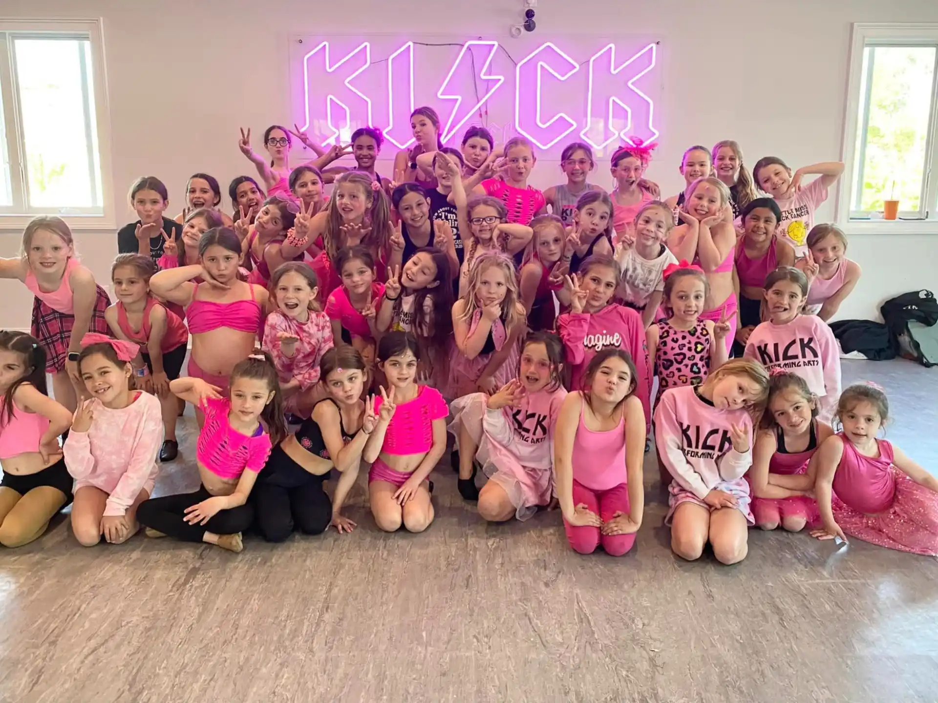 a group of children posing for a photo