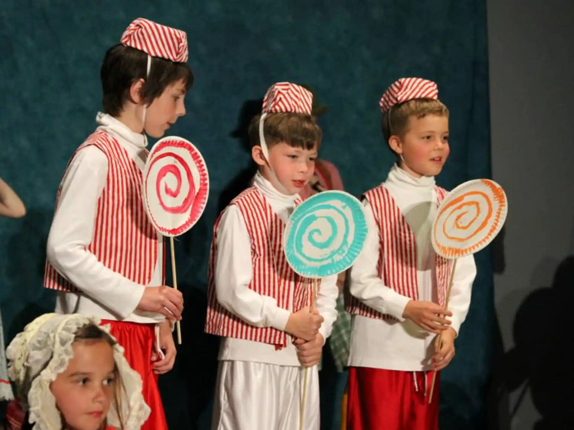 a group of children wearing clothing