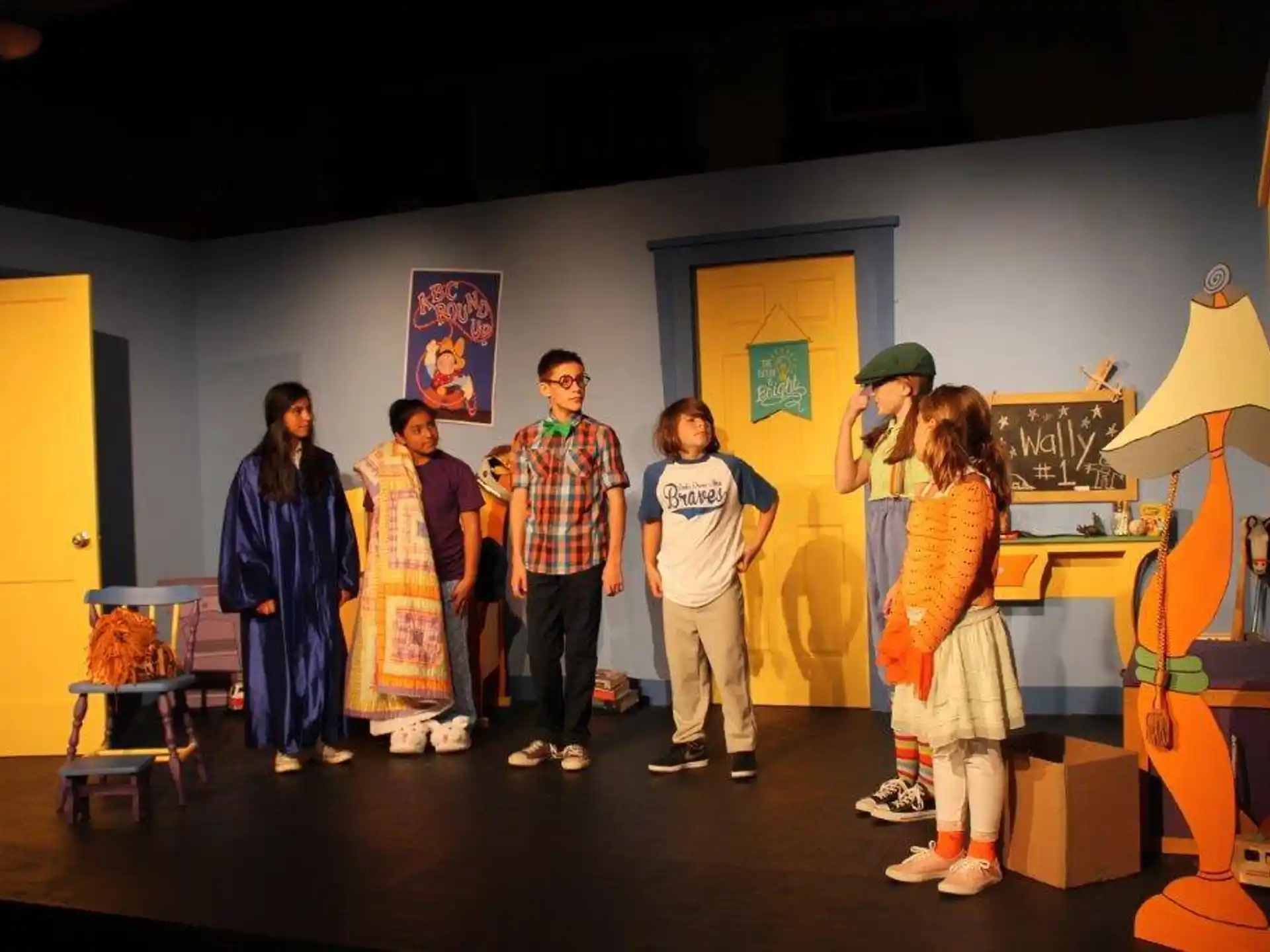 a group of people standing on a stage