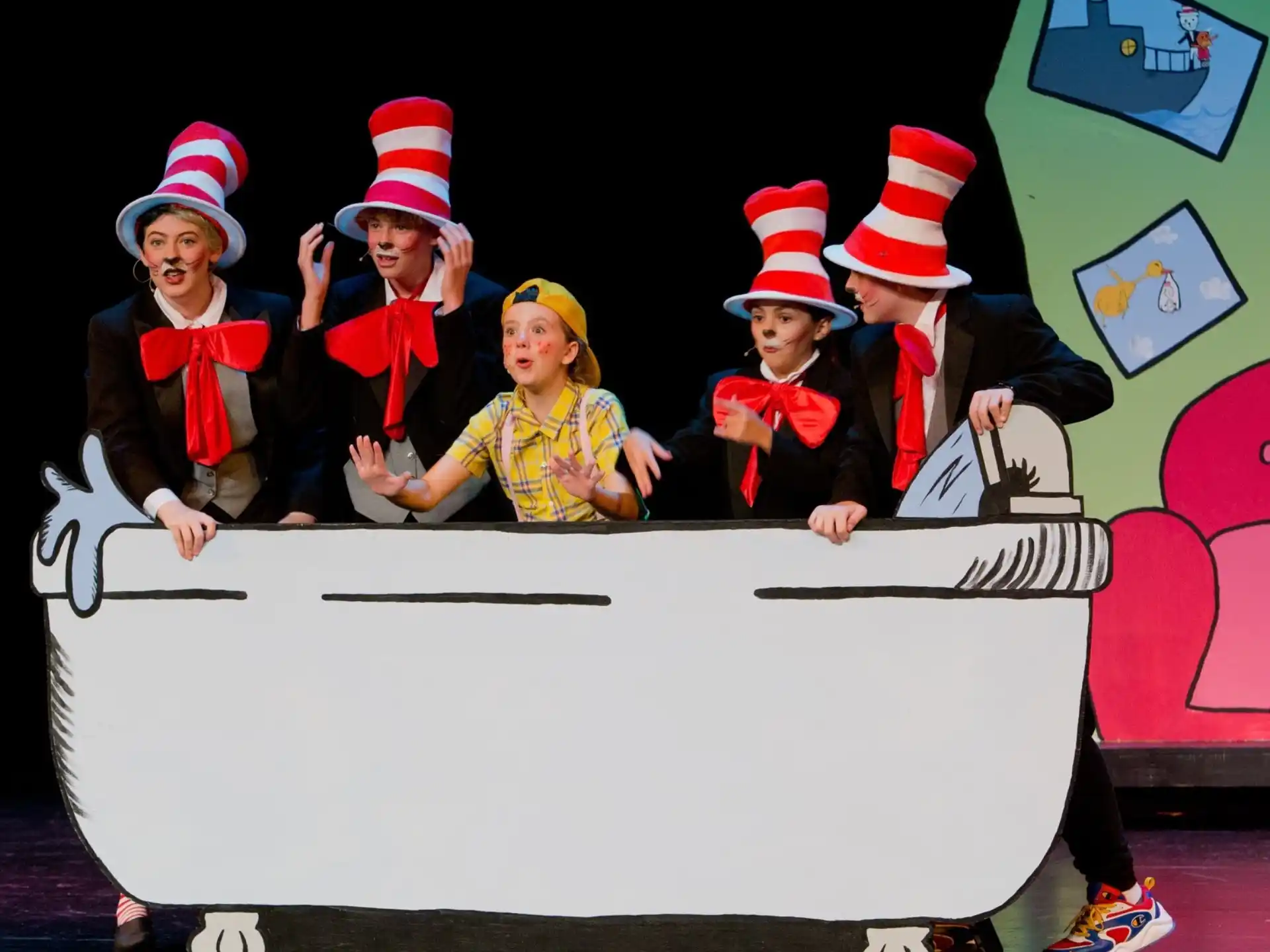 a group of children wearing christmas hats