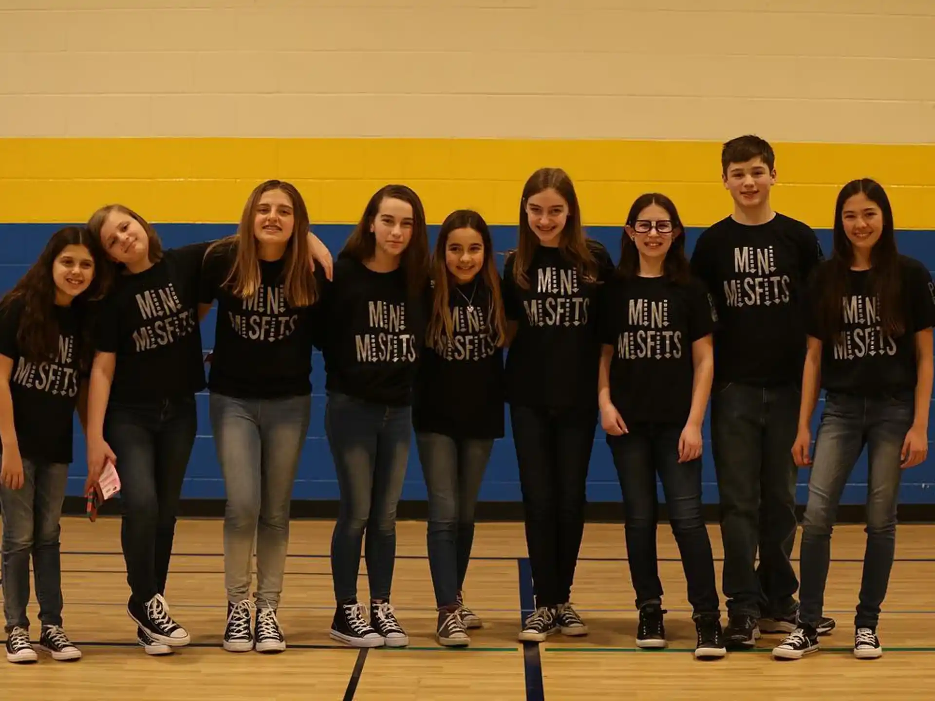a group of people posing for a photo