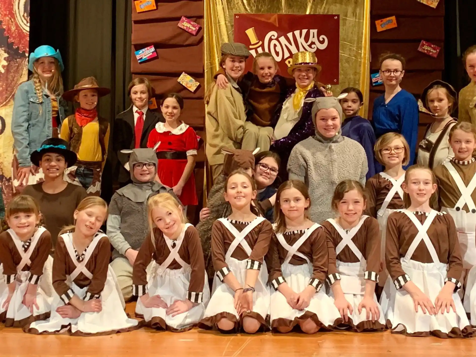 a group of people posing for a photo