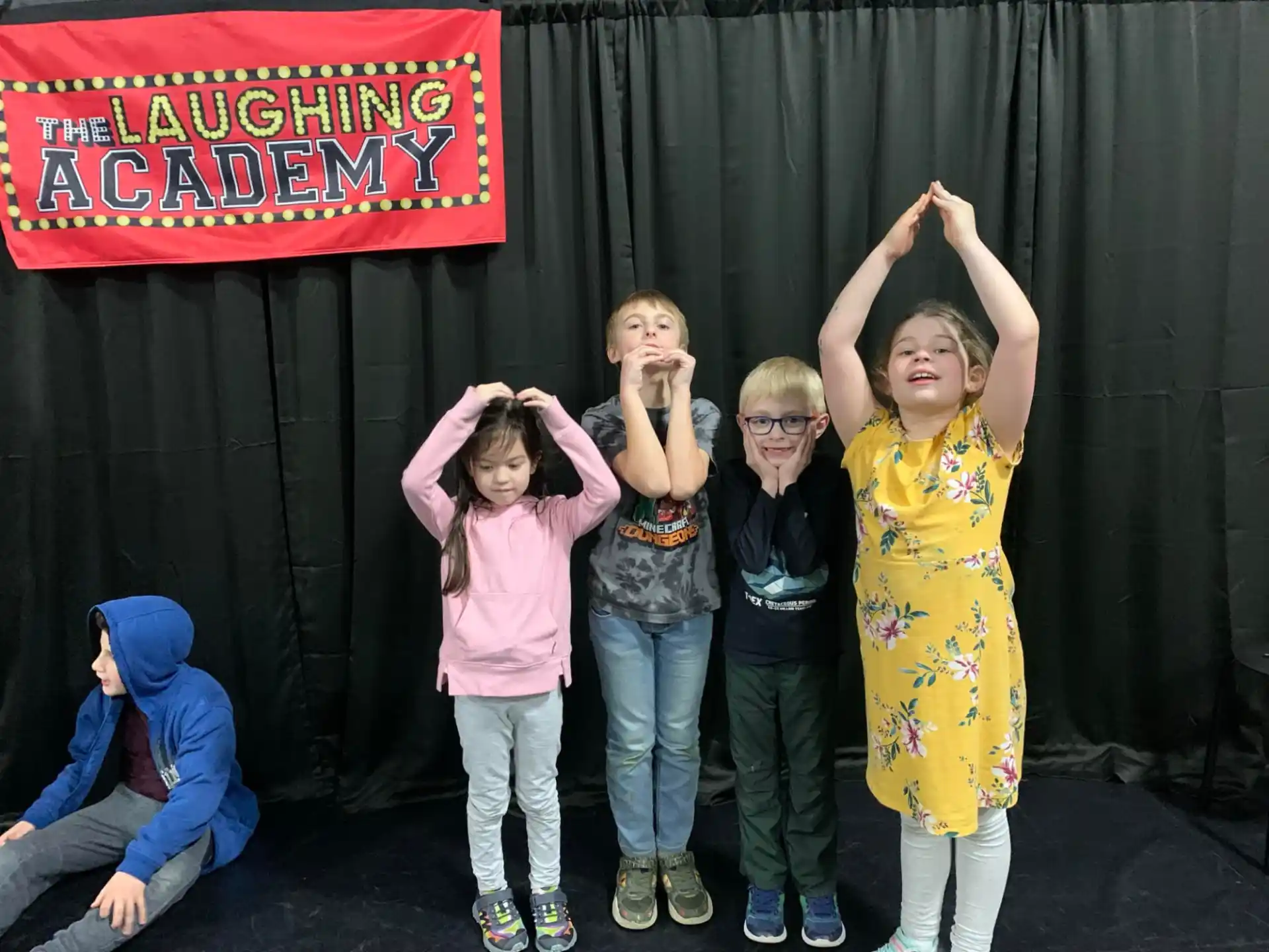 a group of children posing for a photo