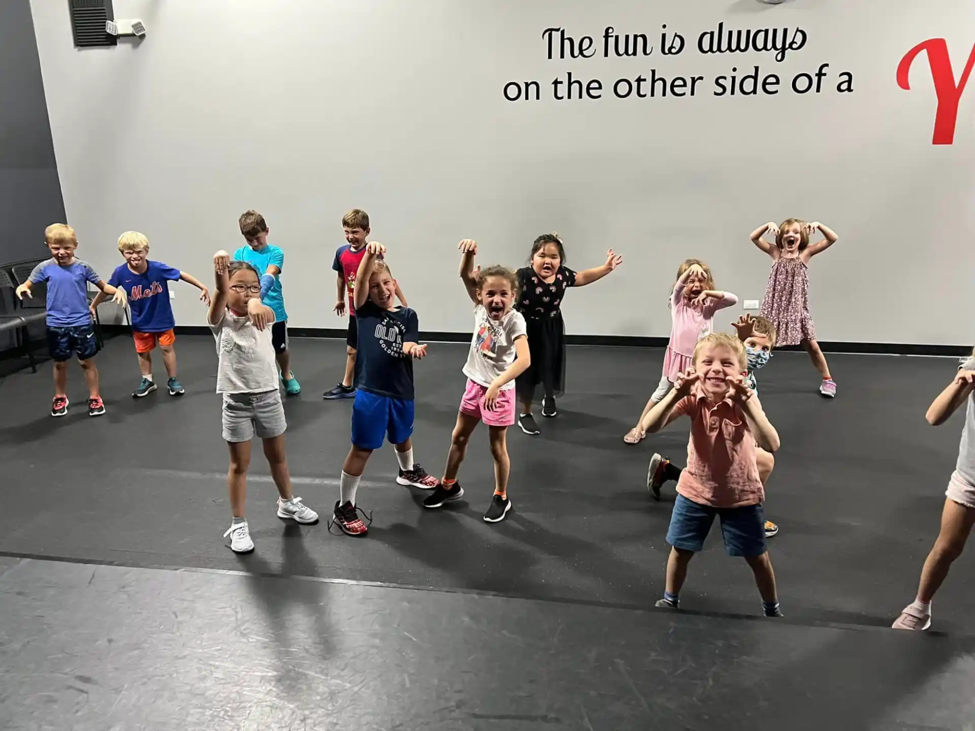 a group of children posing for a photo