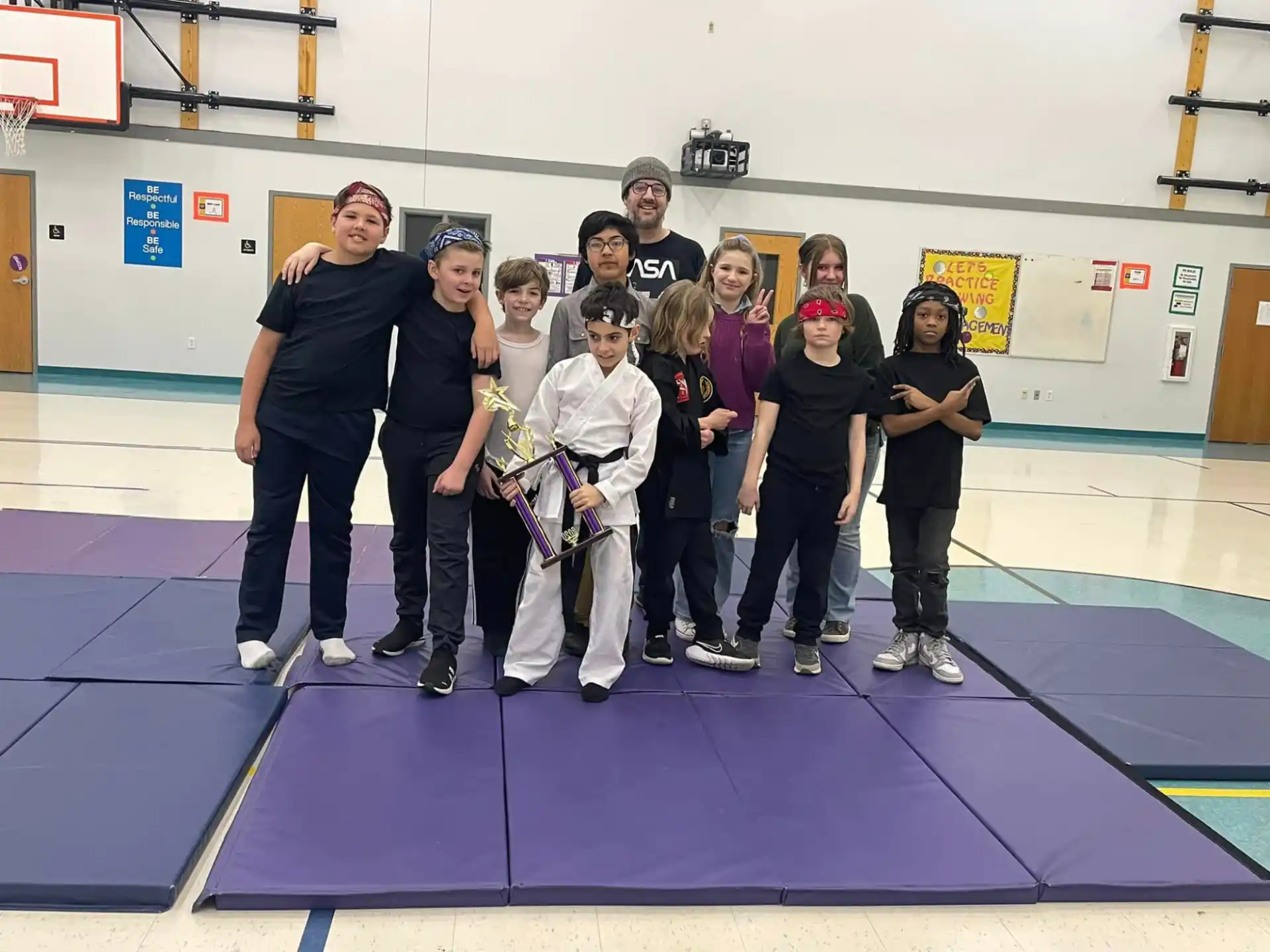 a group of people posing for a photo