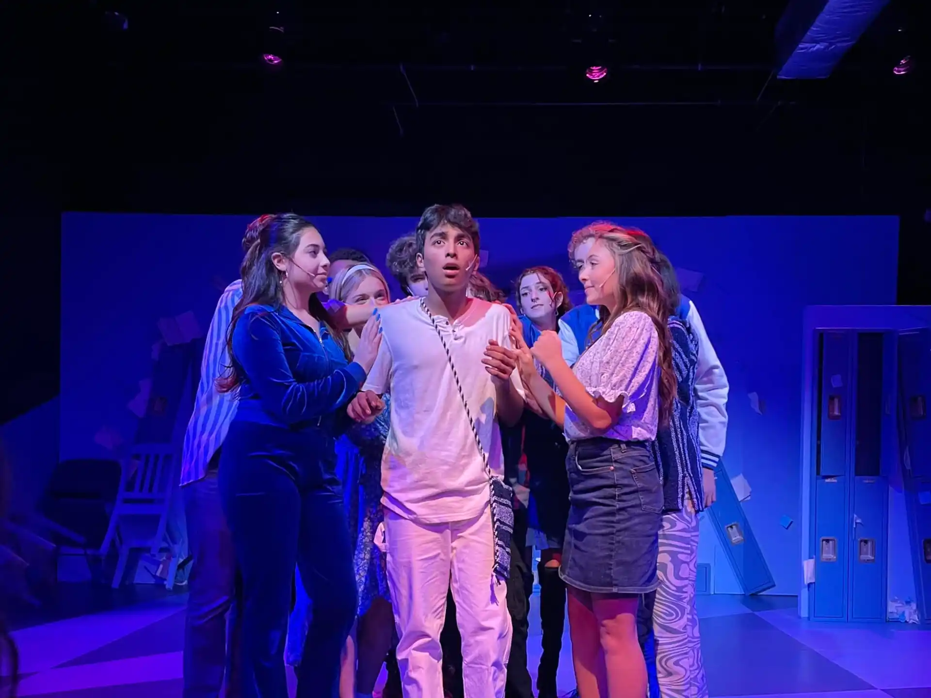 a group of people on a stage