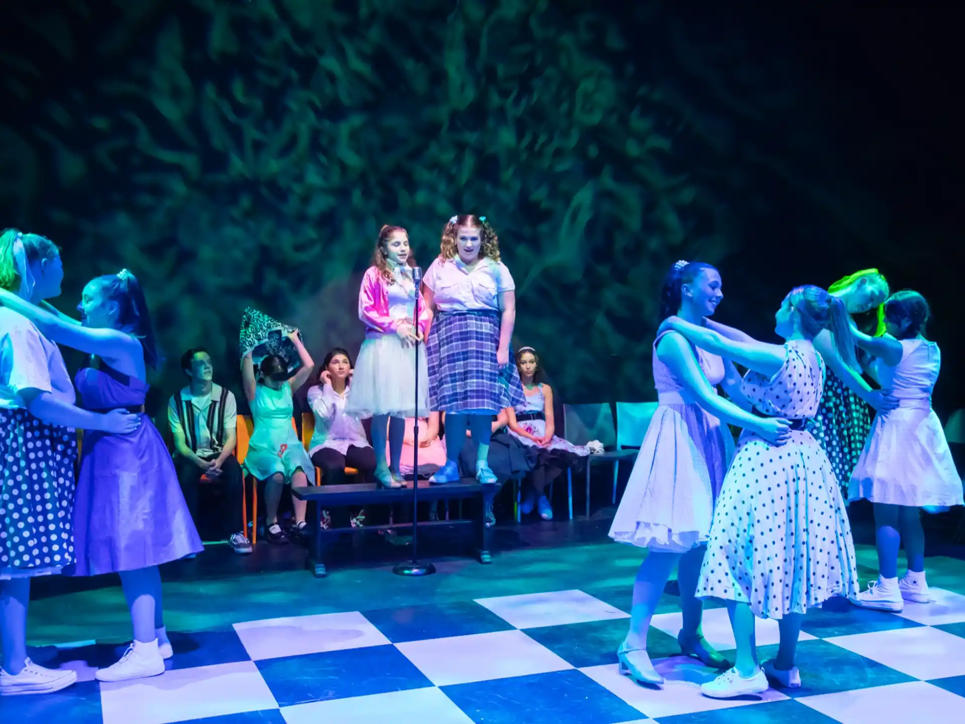 a group of people on a stage
