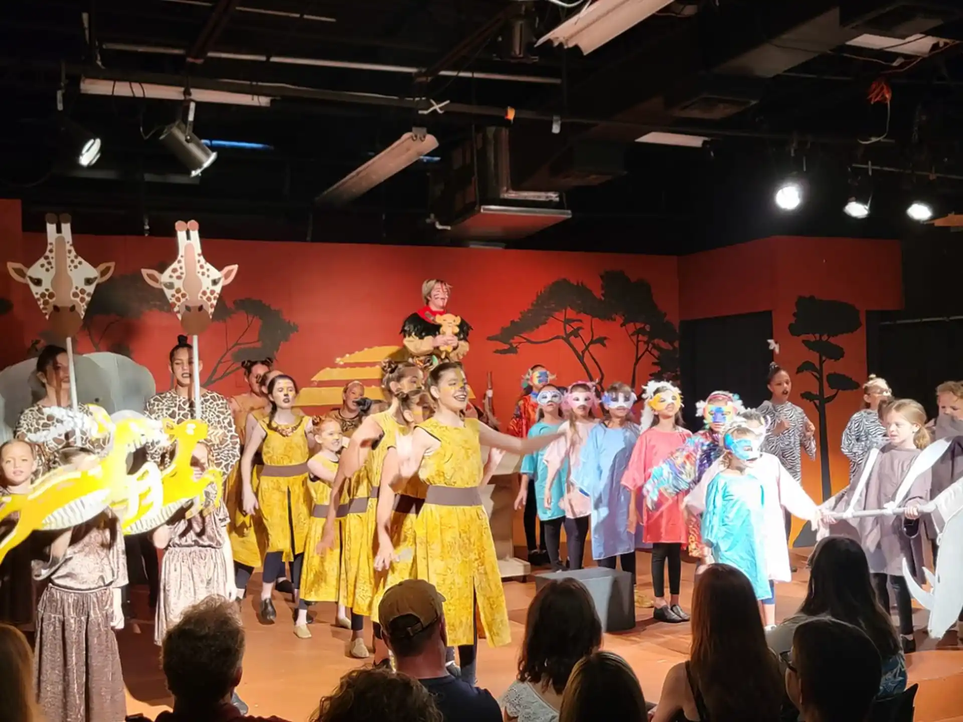 a group of people performing on stage