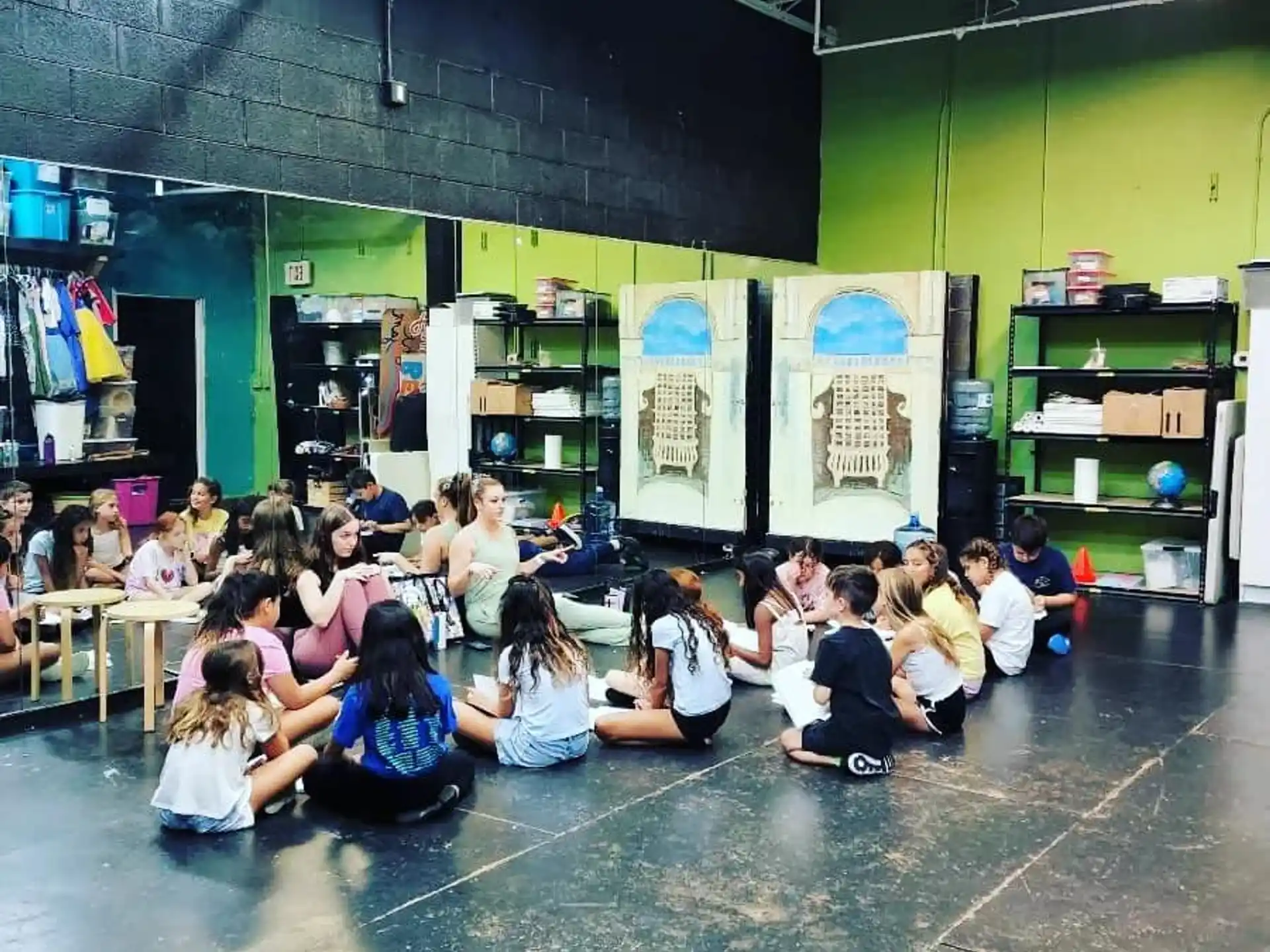 a group of people sitting in a room