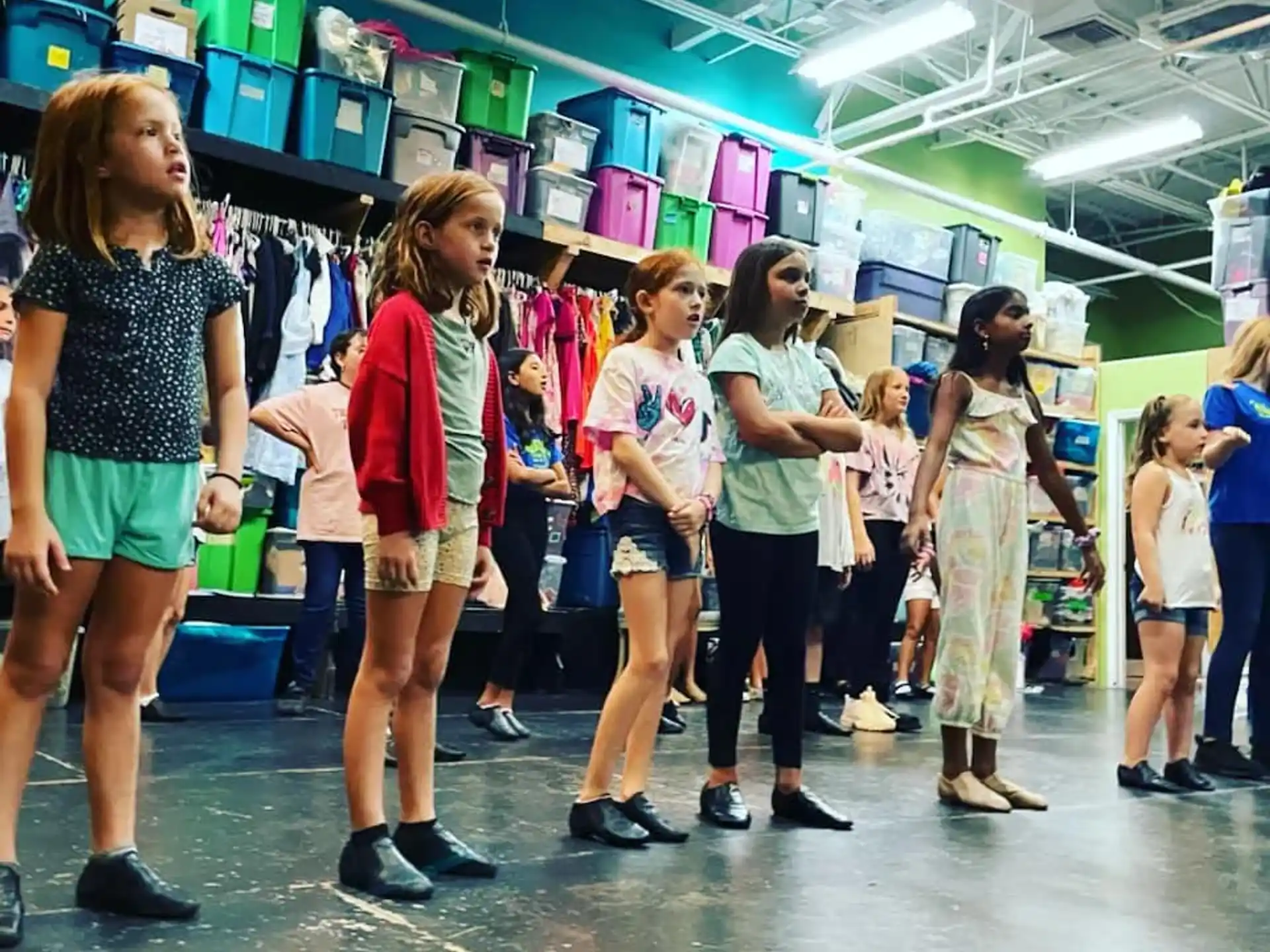 a group of people standing in a room