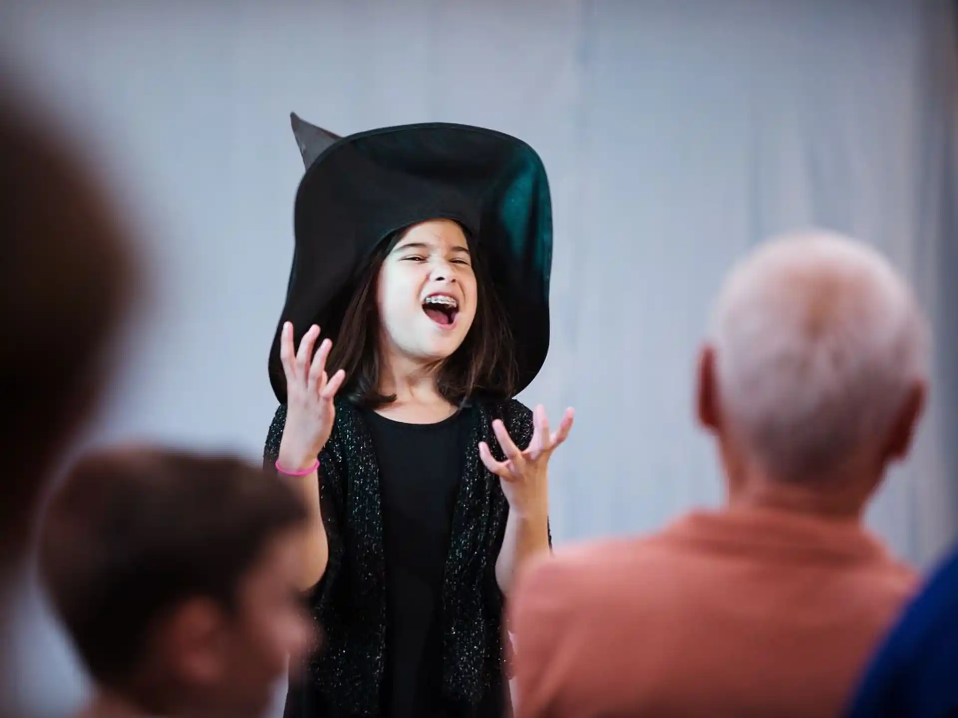 a person wearing a graduation cap