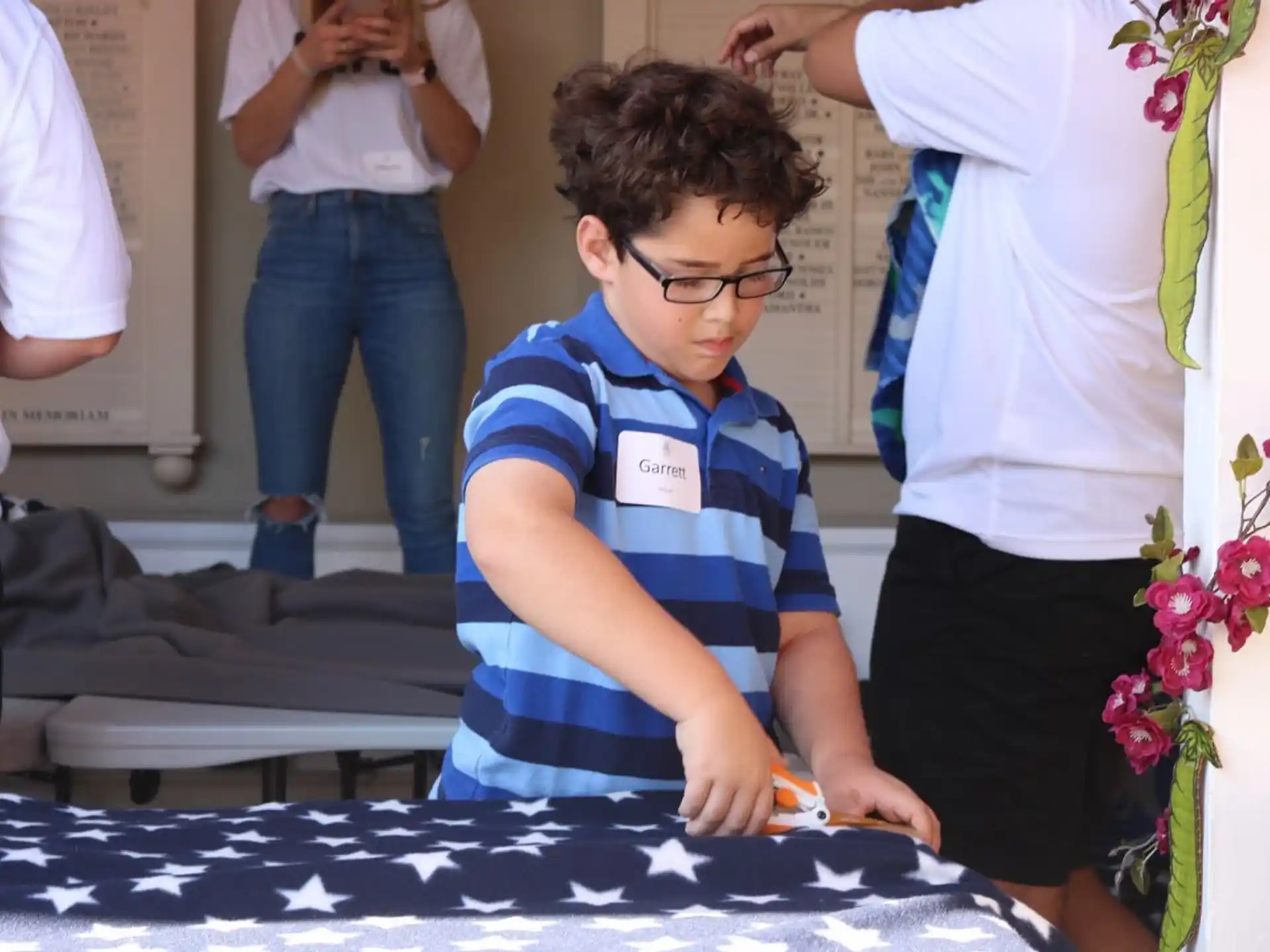 a boy painting a picture