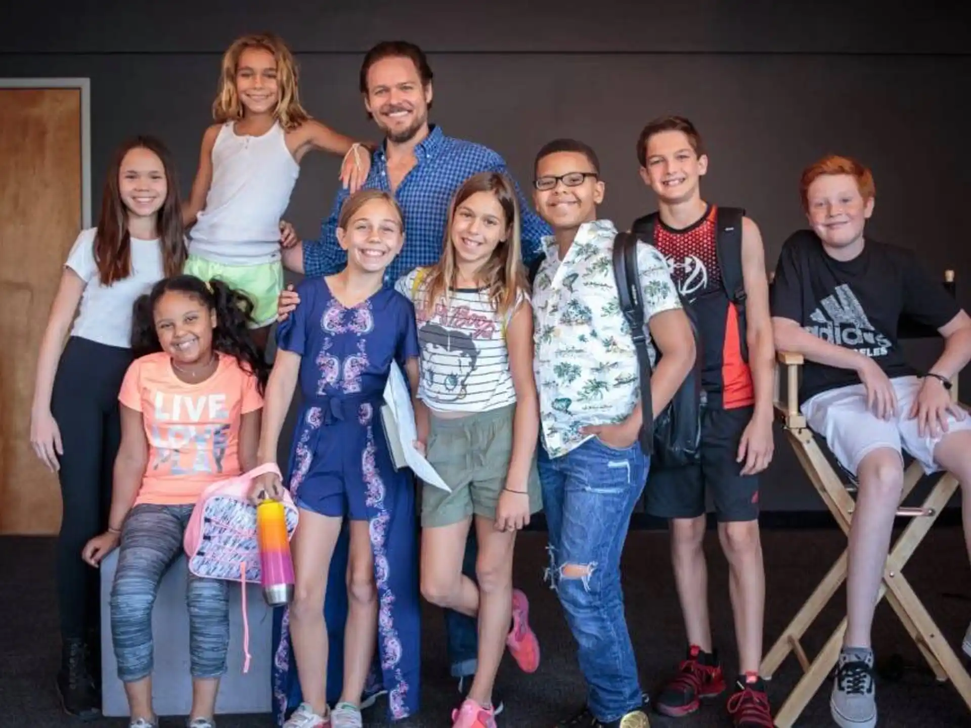 a group of people posing for a photo