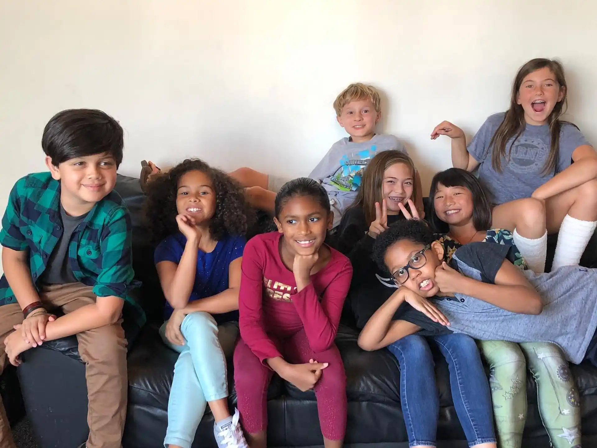 a group of people sitting on a couch