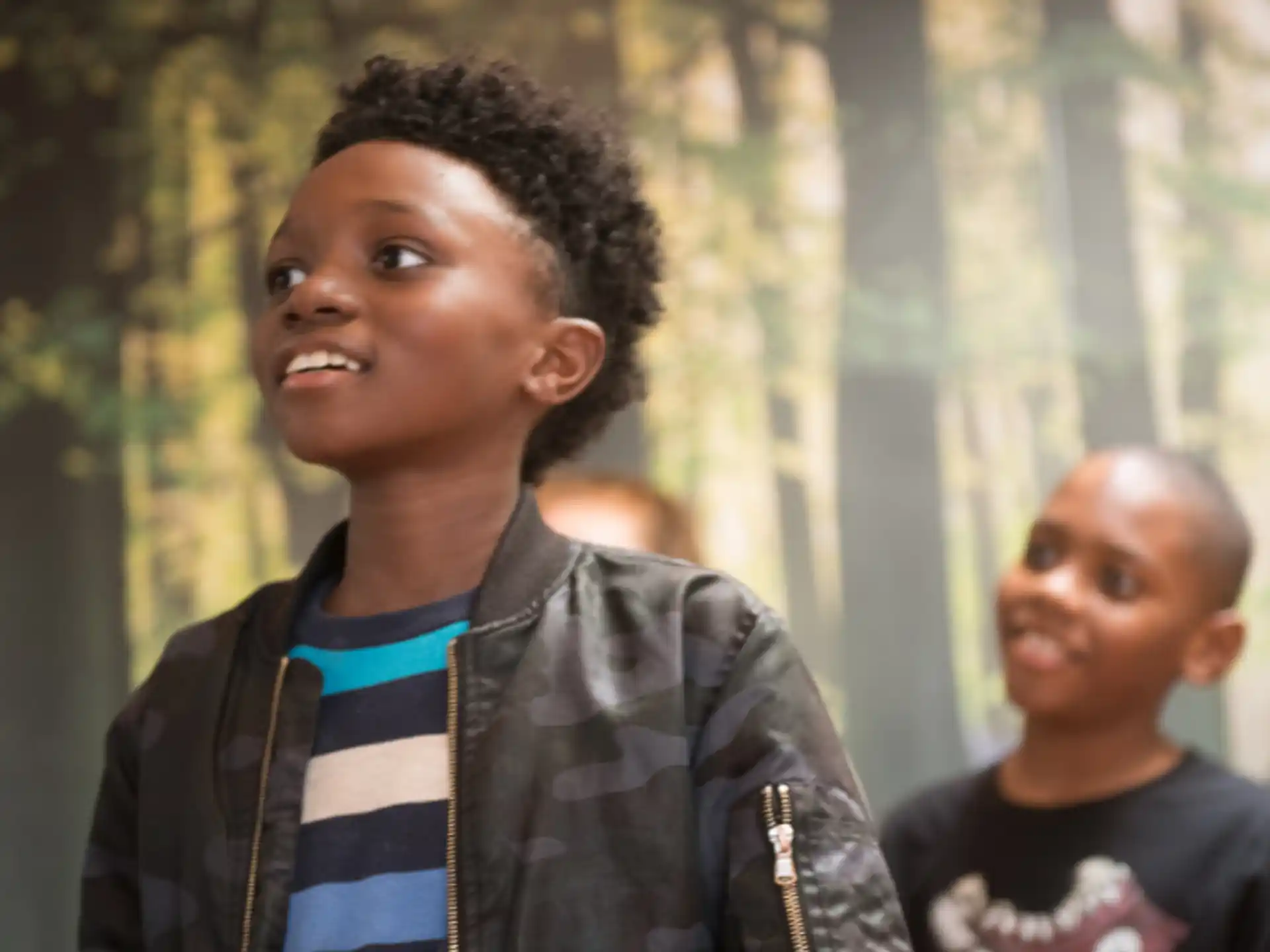 a young boy smiling