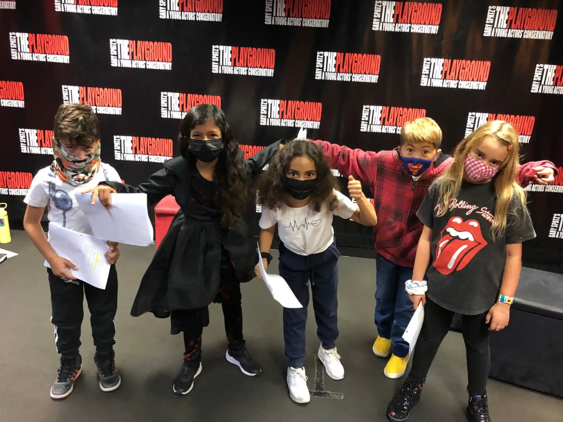 a group of people posing for a photo