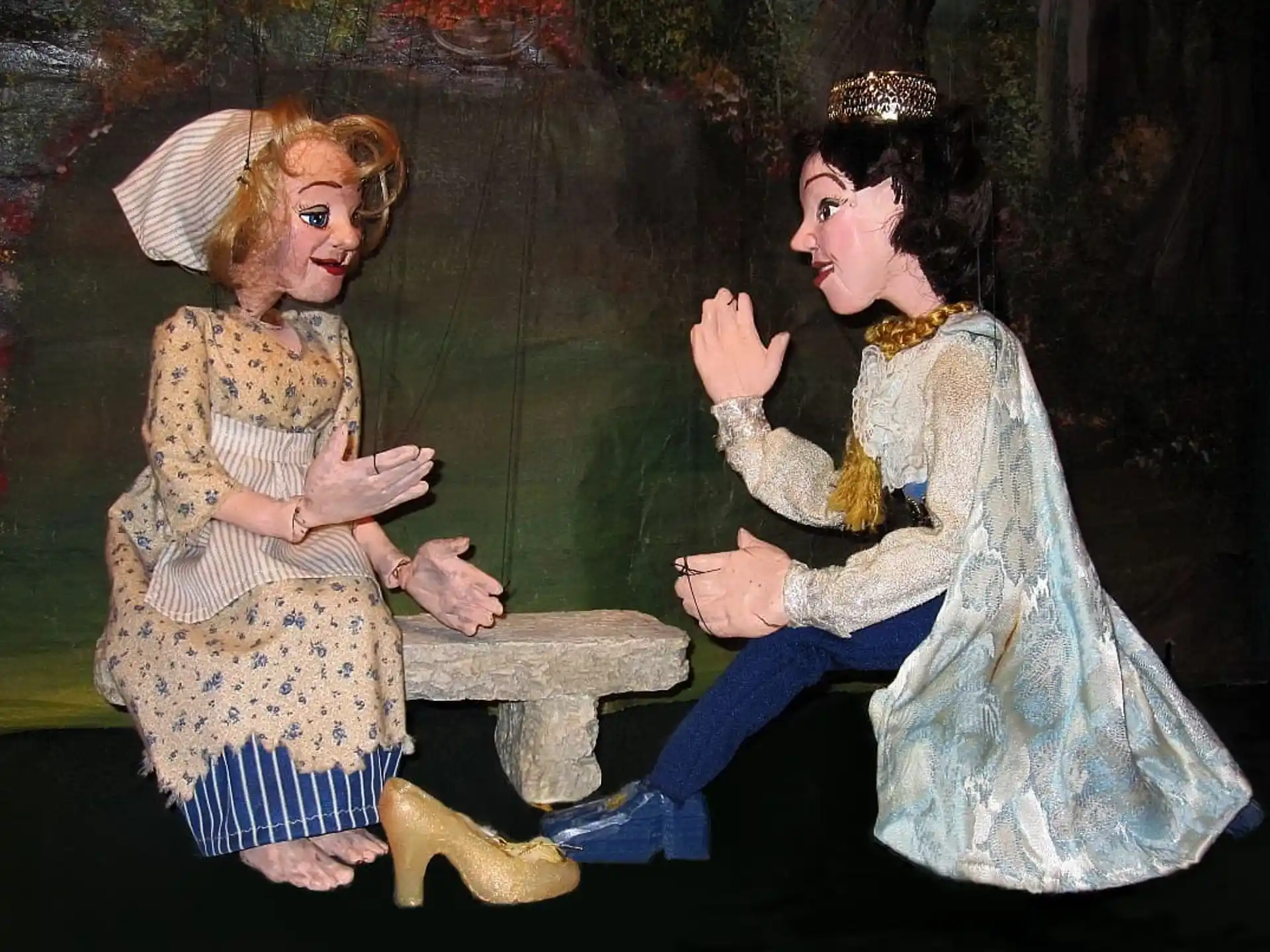 two women sitting on a bench