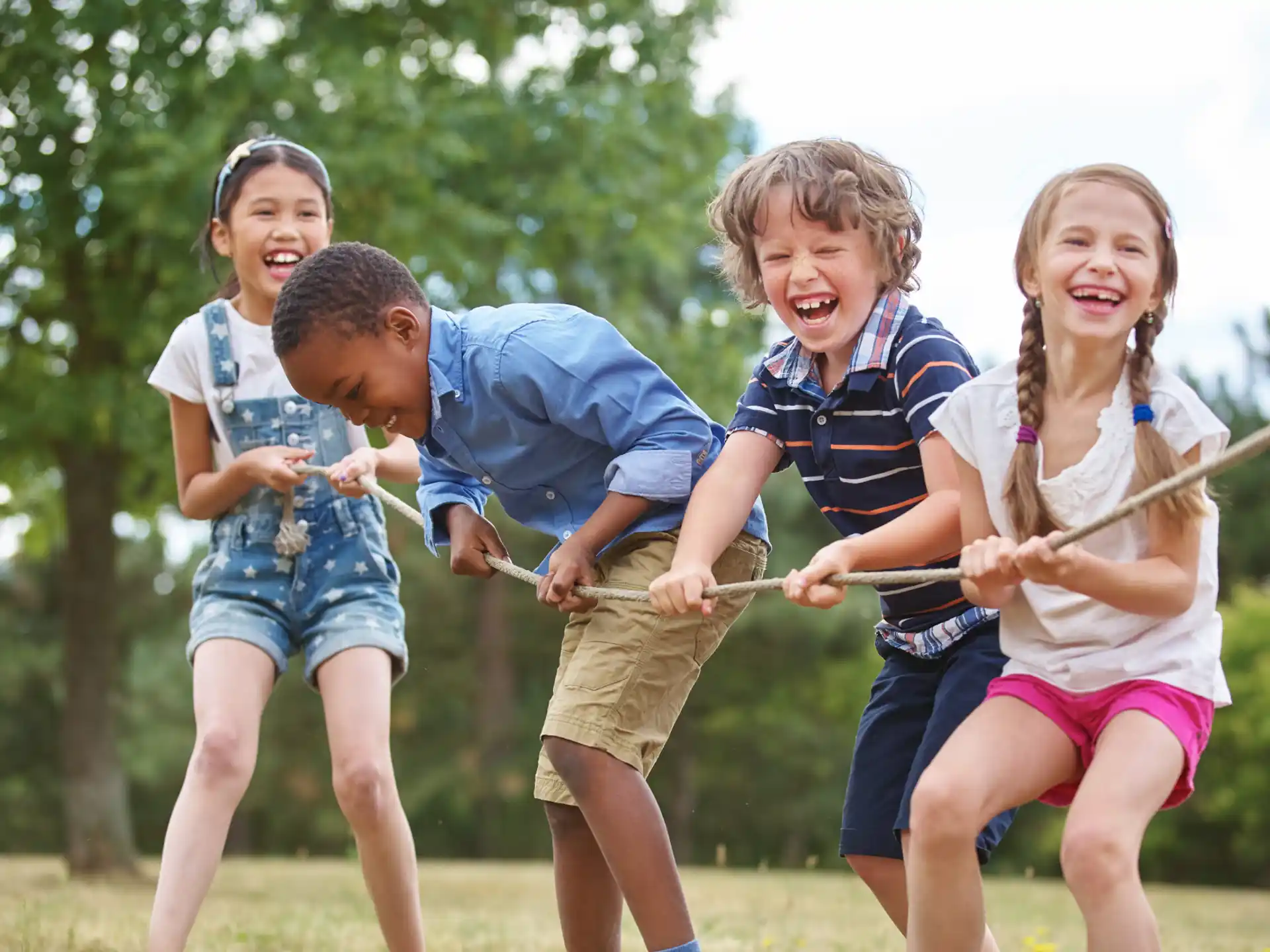 a group of kids playing with a toy