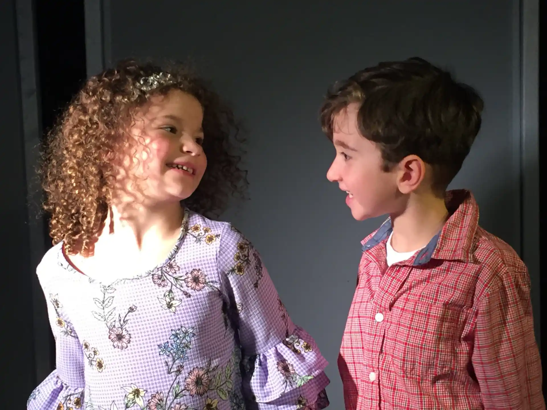 a boy and girl smiling