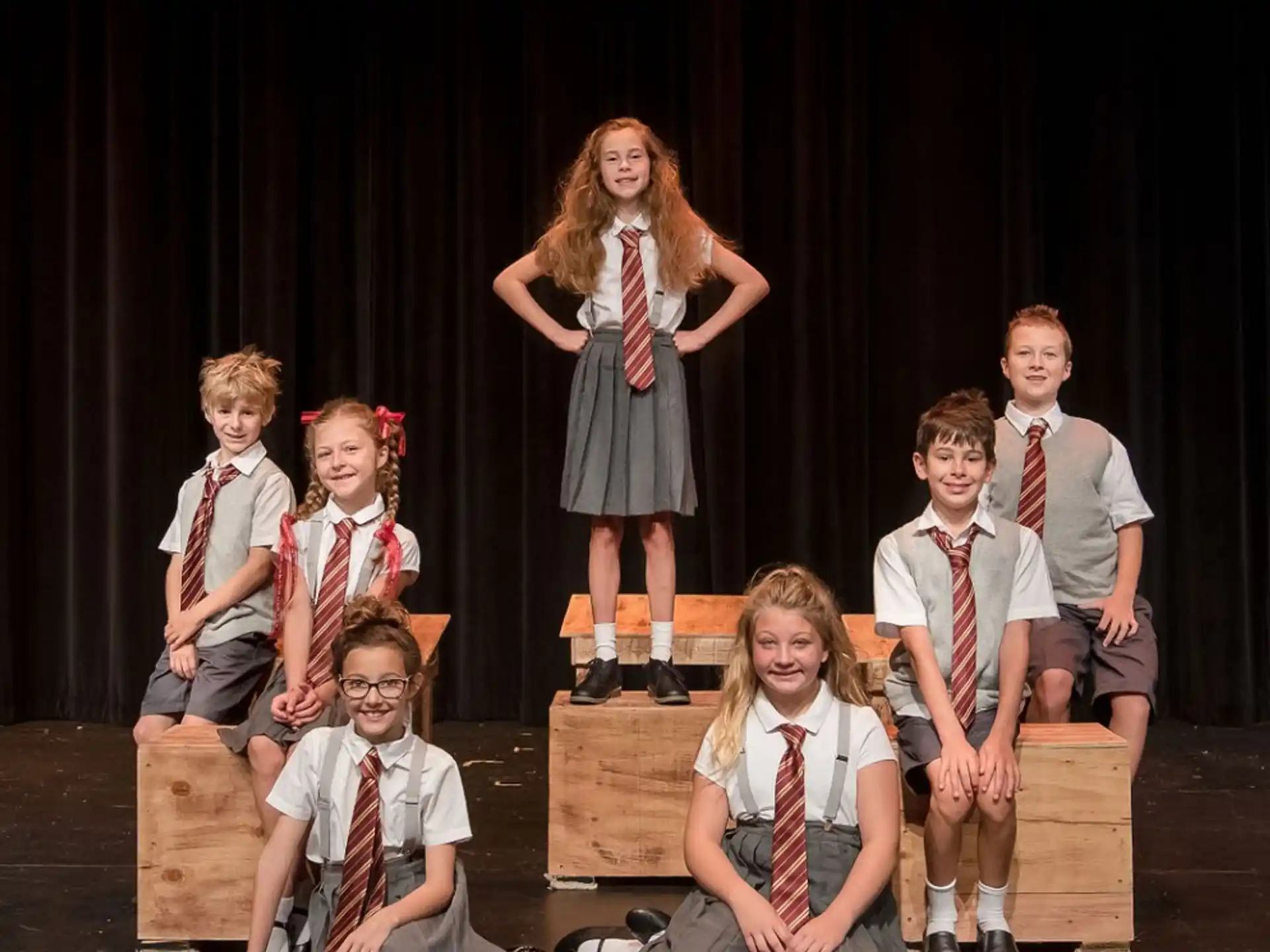 a group of children on a stage