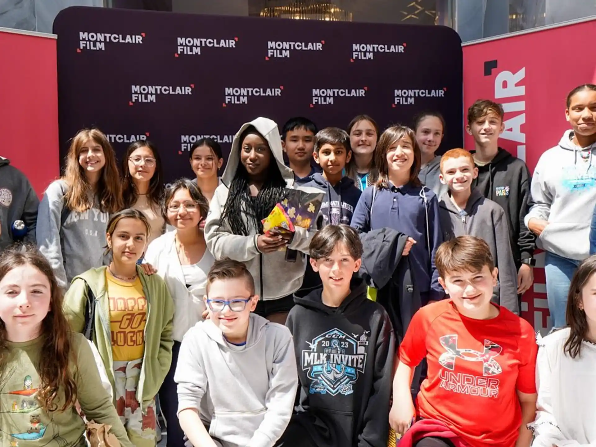 a group of people posing for a photo