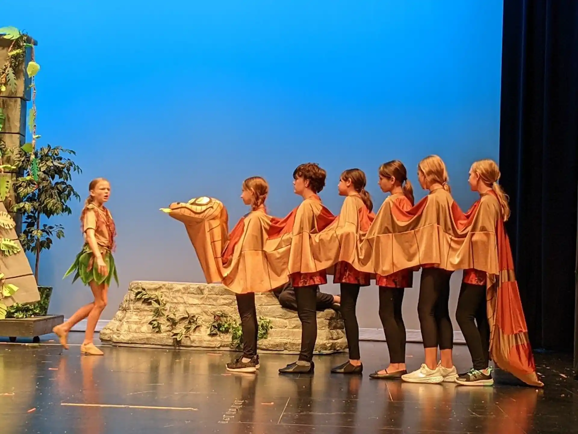 a group of people on a stage